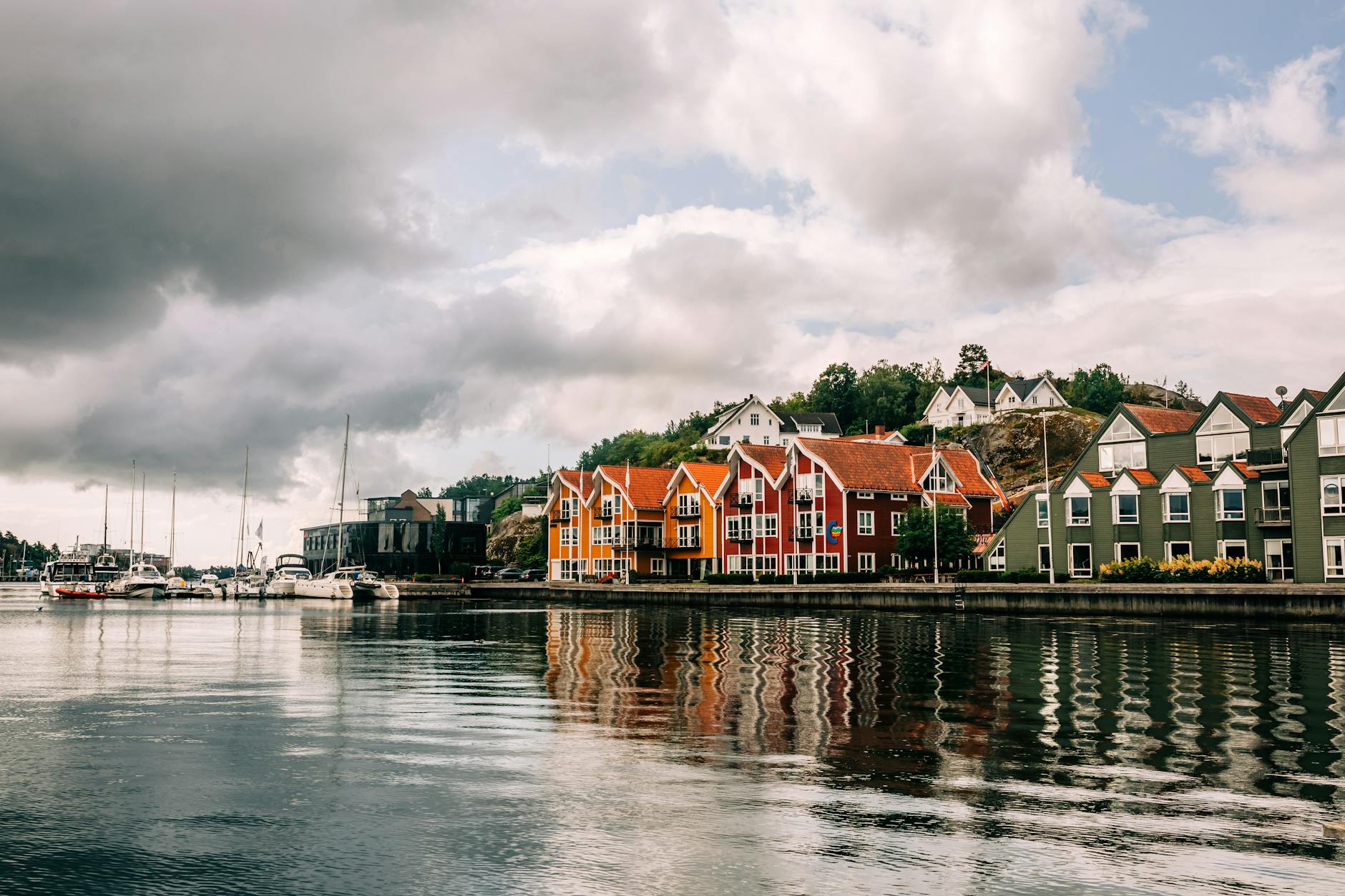 Colorful Norwegian waterfront for Stavanger conference sightseeing planning.