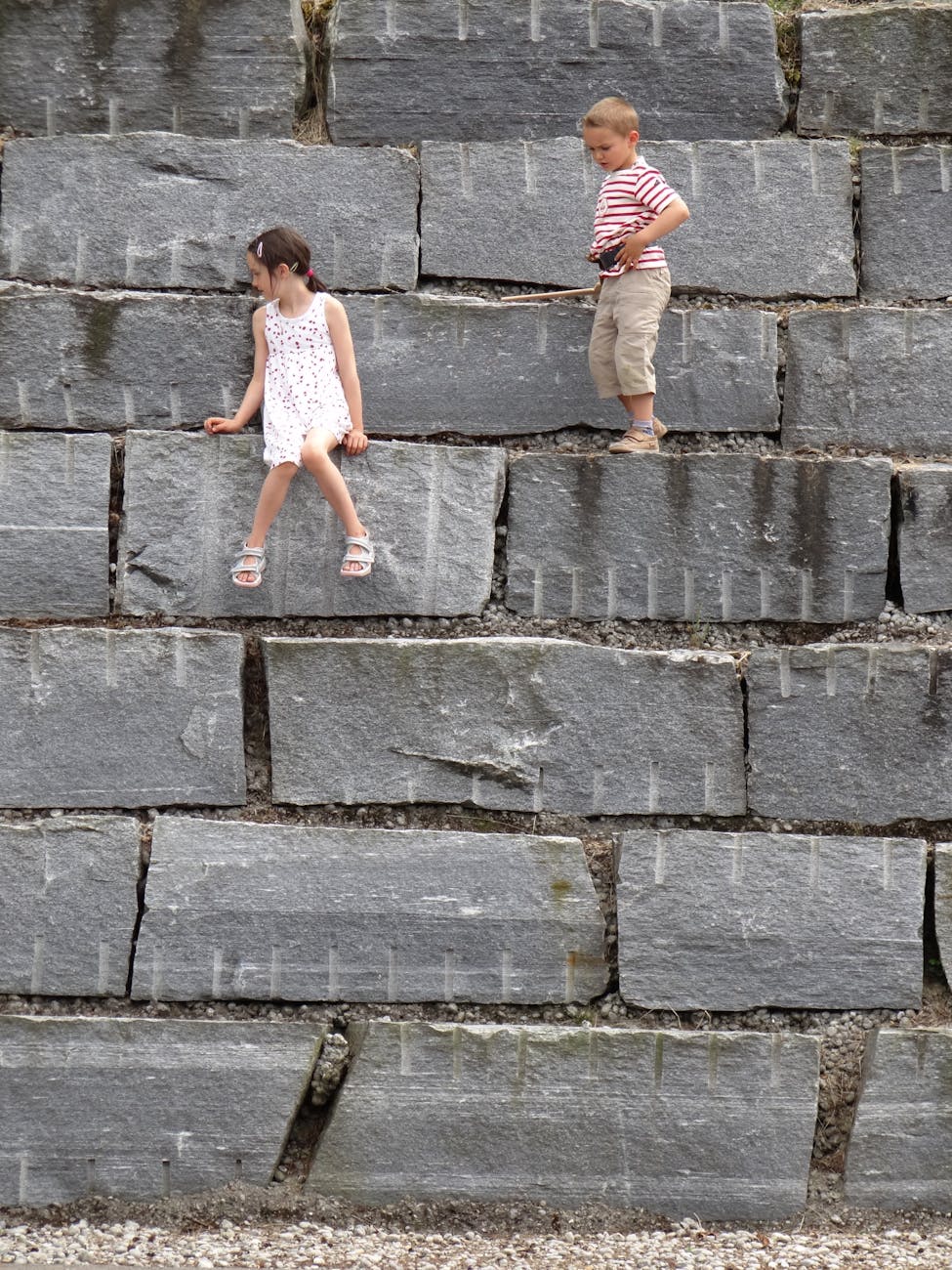 Children climbing outdoors for Stavanger family weather planning.