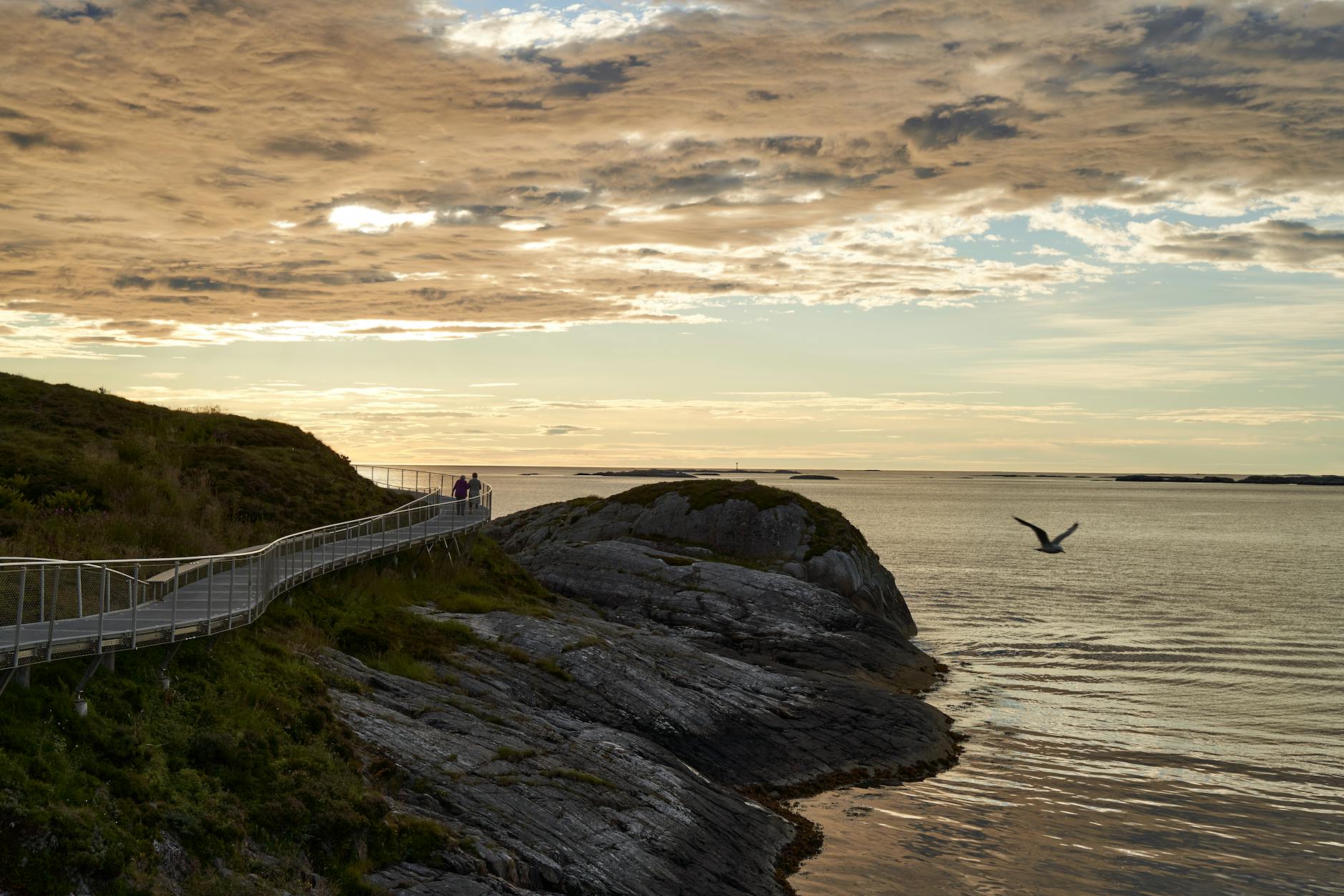 Wooden trail by the sea for Stavanger family travel report planning.