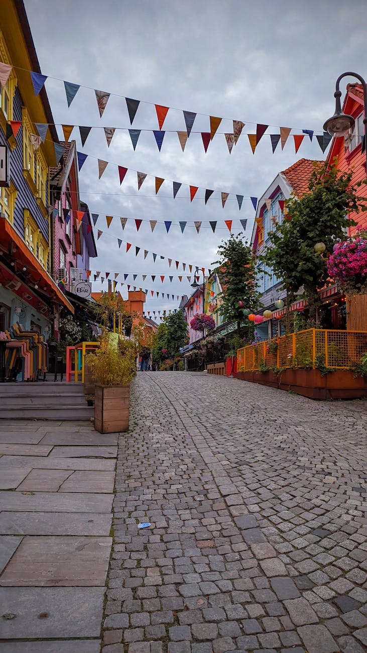 Colorful Stavanger cobblestone street for first-time regional planning.