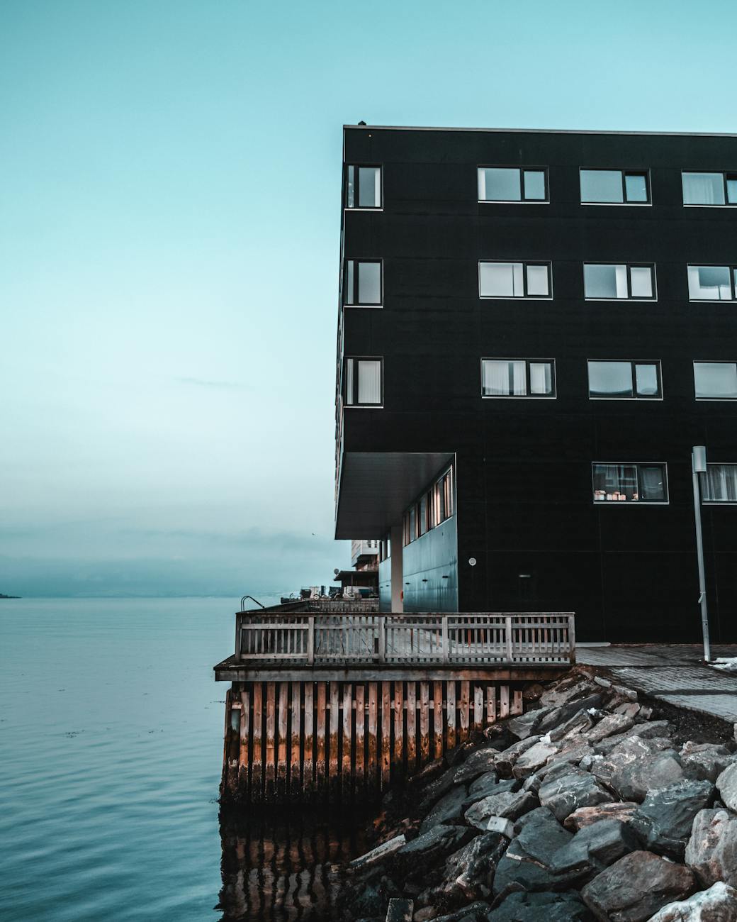 Modern waterfront building for Stavanger luxury travel report planning.