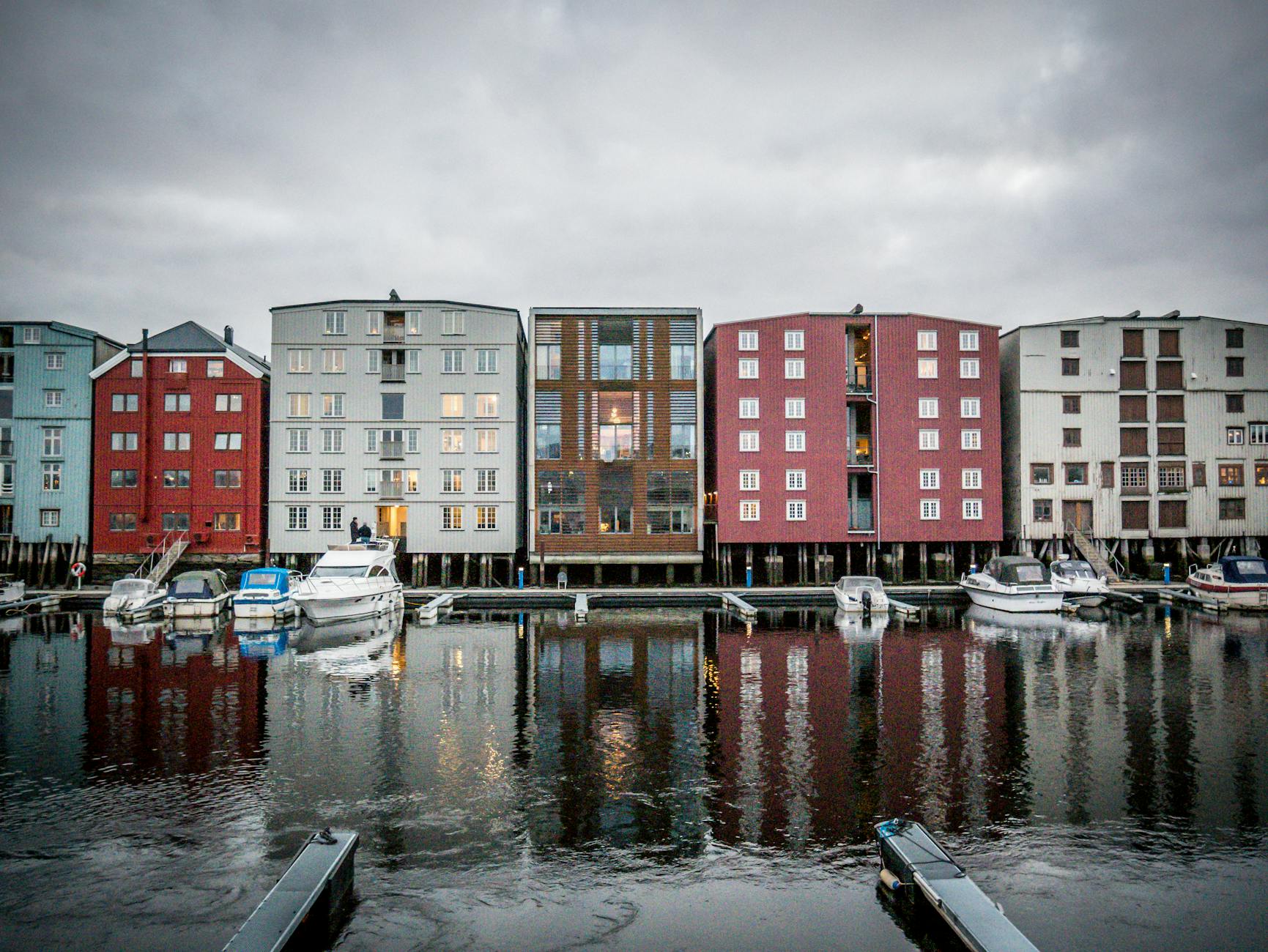 Modern waterfront buildings and boats for Stavanger luxury travel planning.