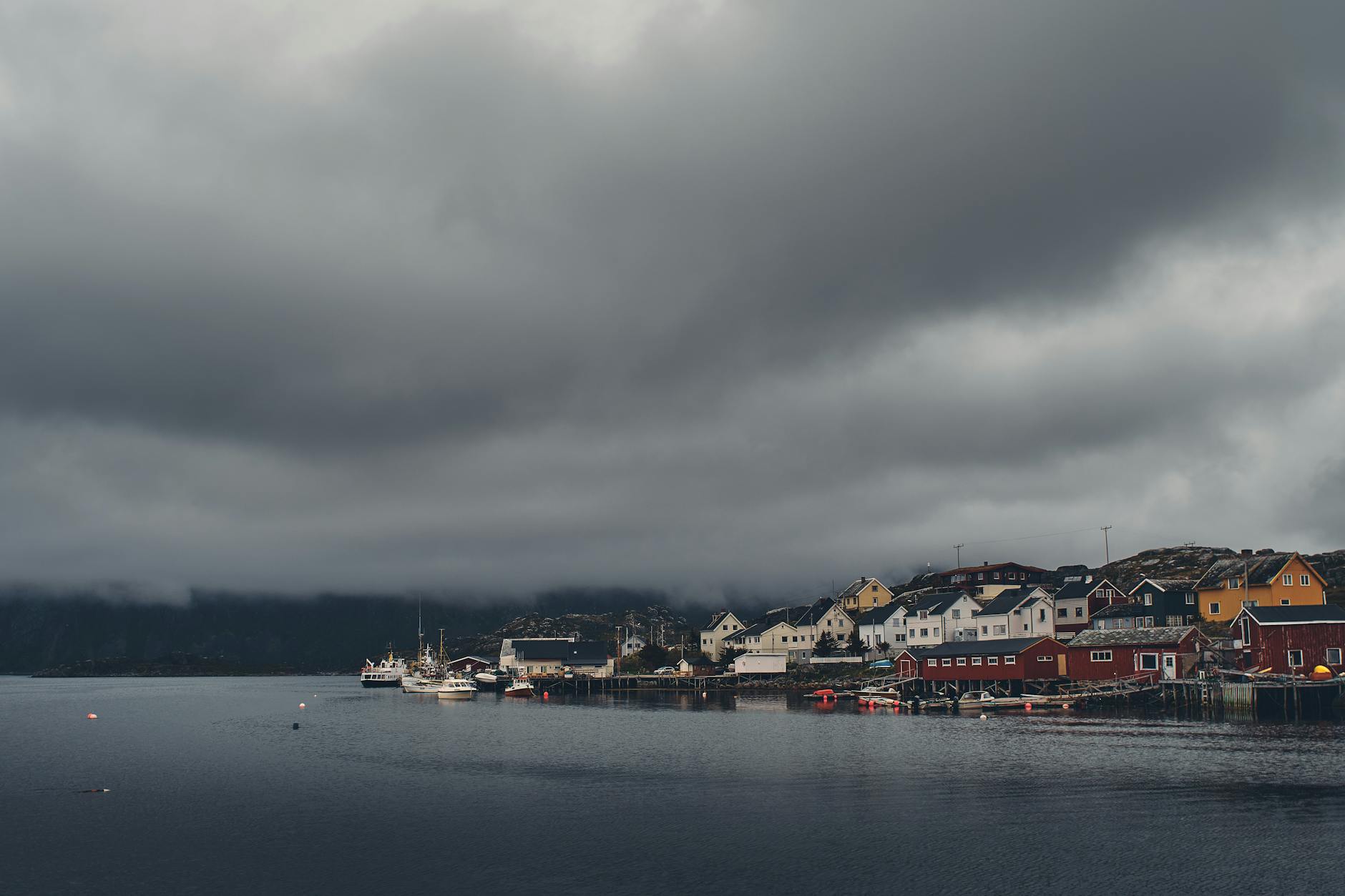 Rainy Stavanger harbor for pilgrimage weather planning.