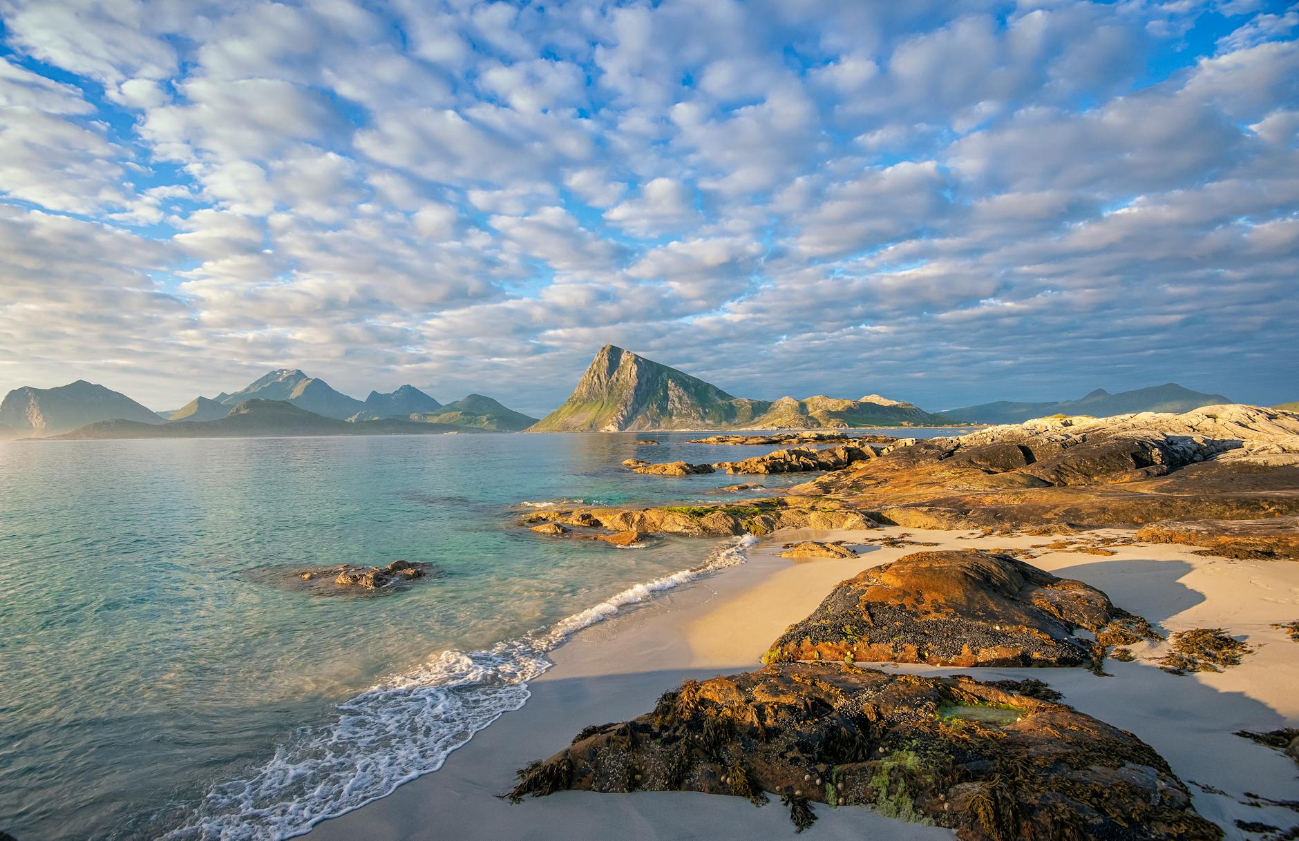 Sandnes beach and cloudy coast for Stavanger repeat visitor planning.