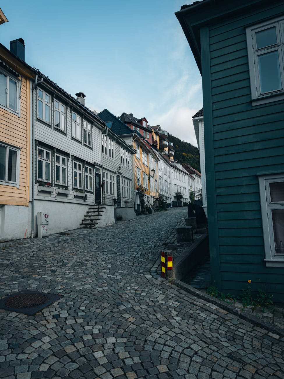 Cobblestone old-town street for Stavanger solo hotel planning.