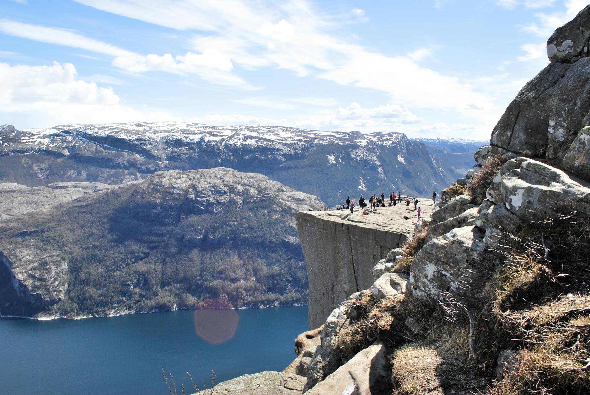 Tourists at Preikestolen for Stavanger short-term travel planning.