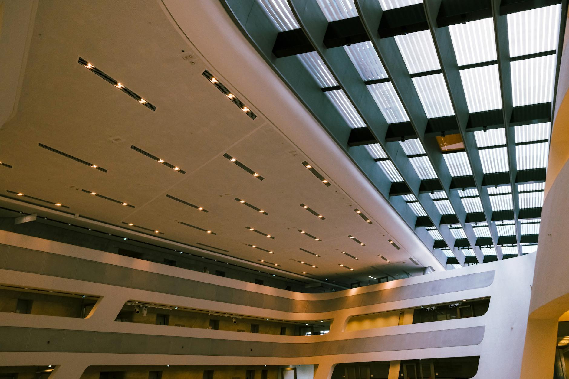 Modern glass-ceiling venue interior for Stavanger trade-show planning.