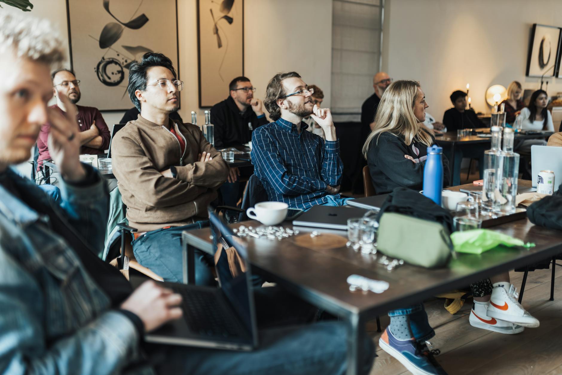 People at a conference table for Stockholm session planning.