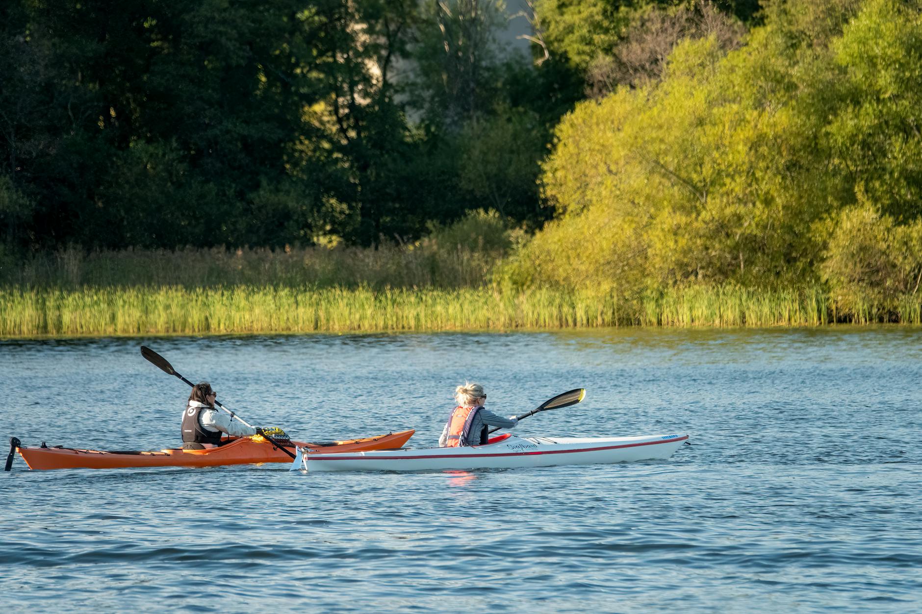 Kayakers on a Stockholm waterway for outdoor gear planning.