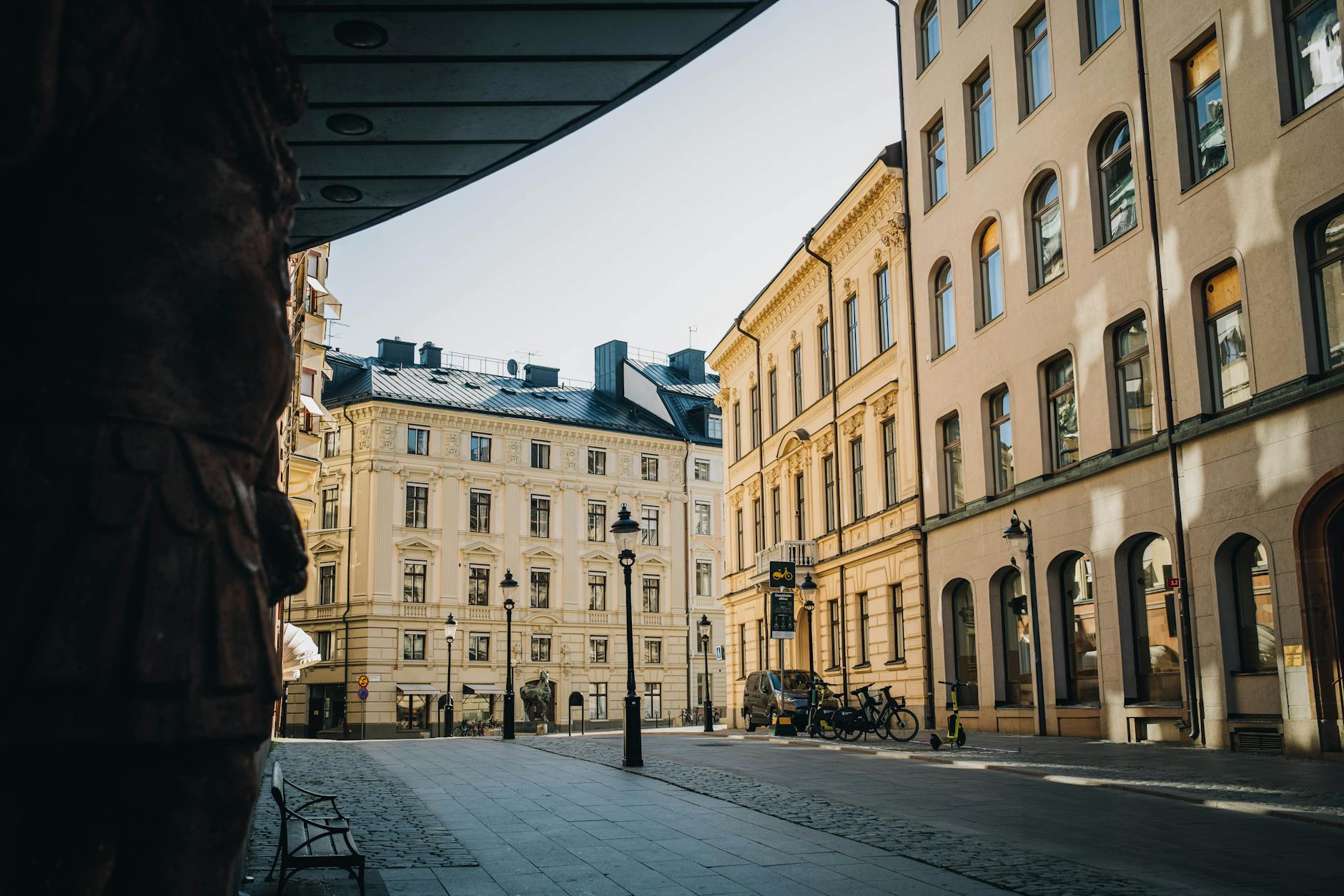 Cobblestone Stockholm street for selective budget sightseeing planning.