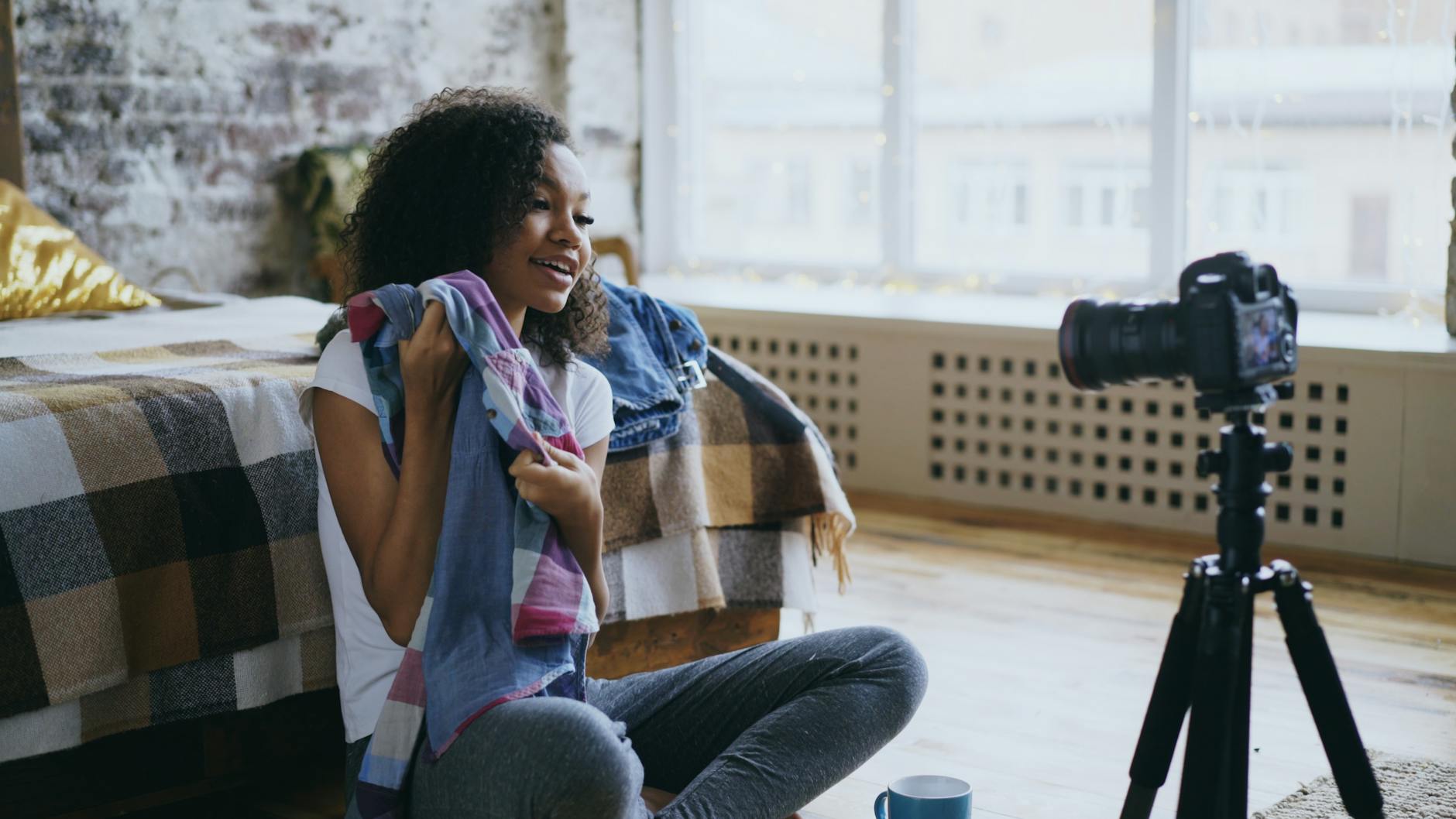 Creator filming a vlog for Stockholm content brief planning.