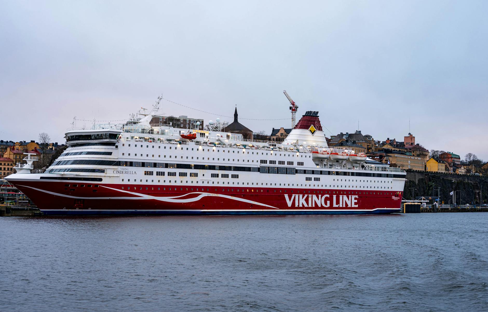 Cruise ship docked in Stockholm for port-call planning.
