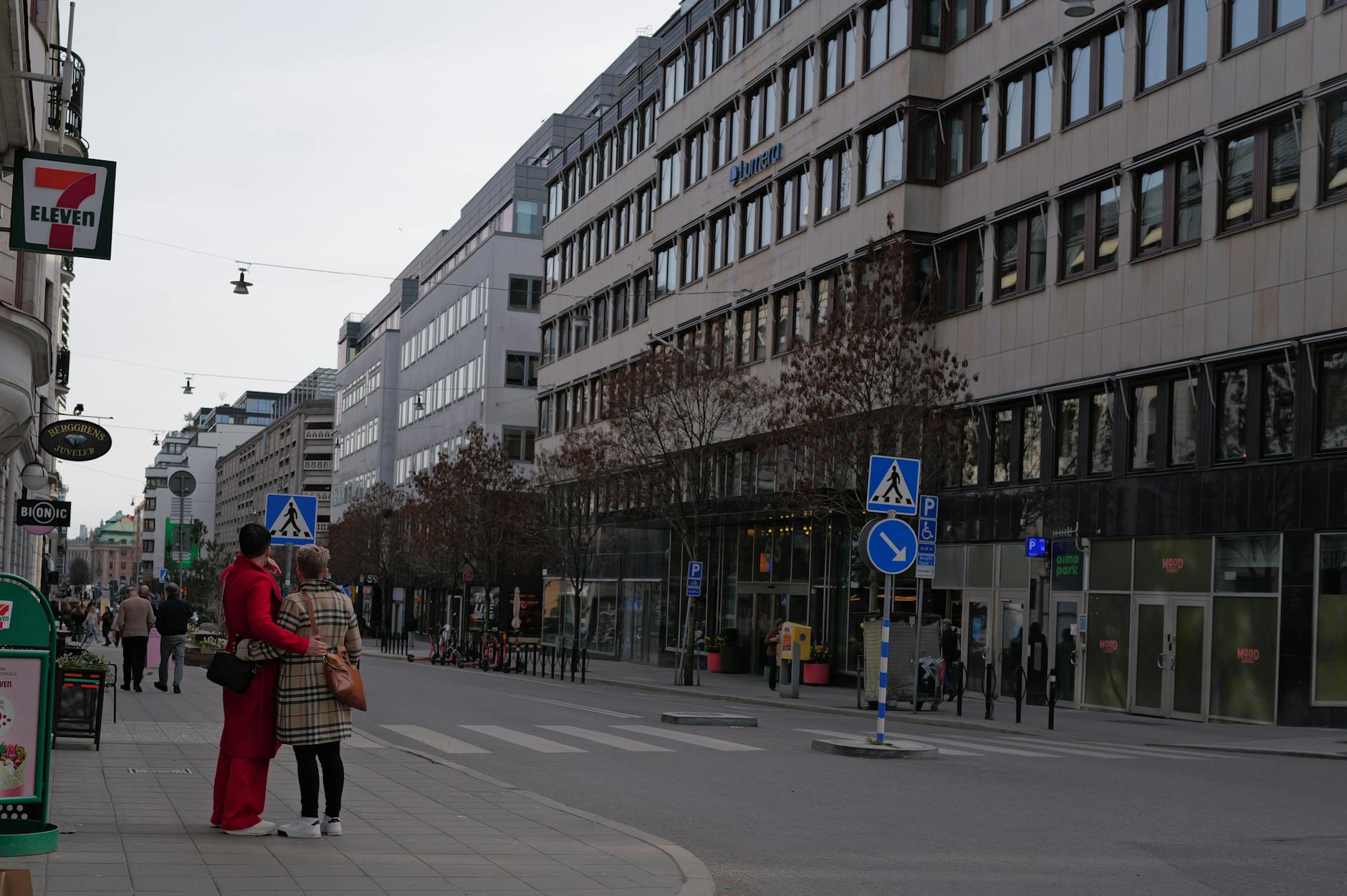 Lively Stockholm street for journalist travel report planning.