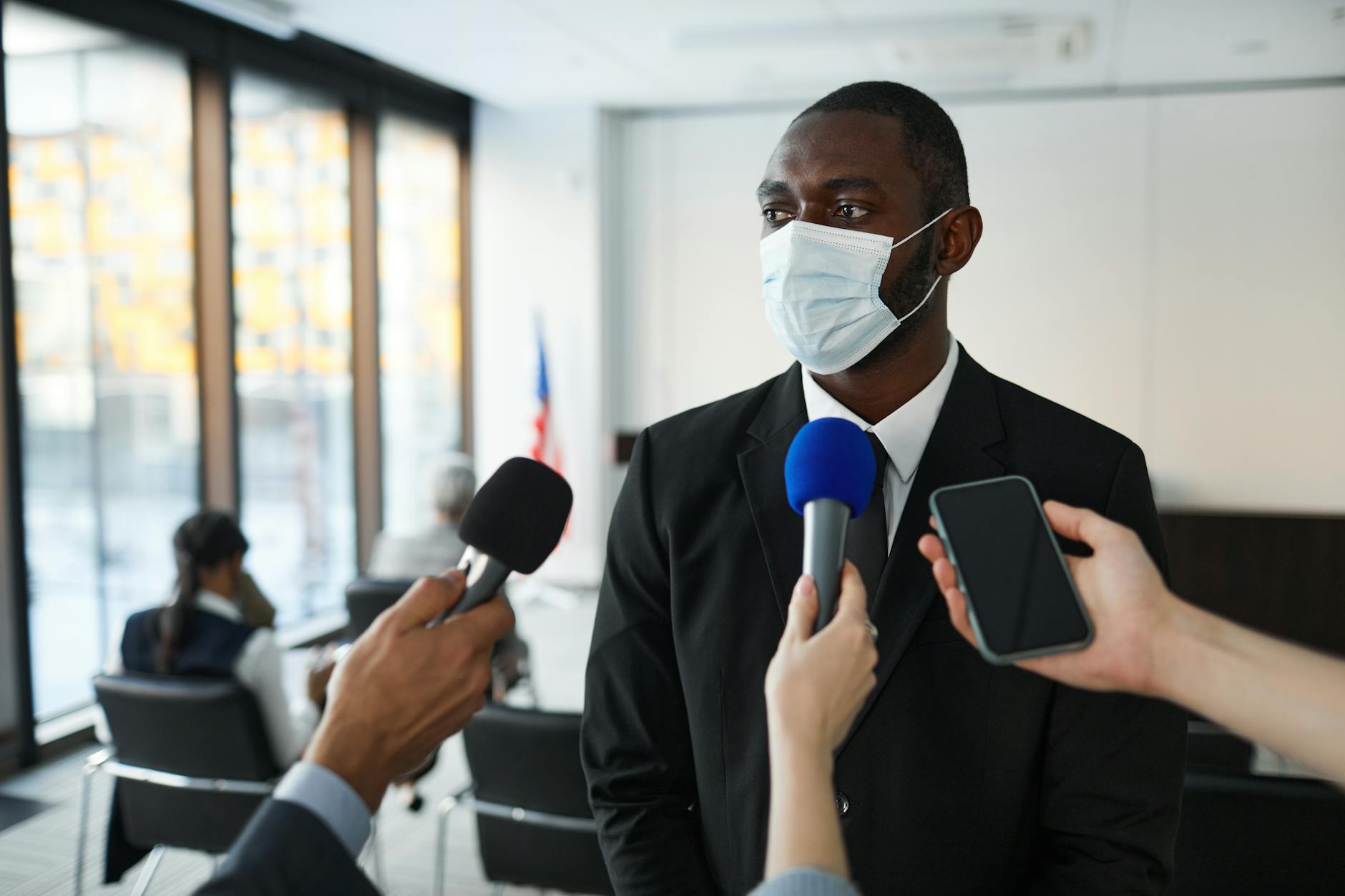 Person speaking to media for Stockholm source care planning.