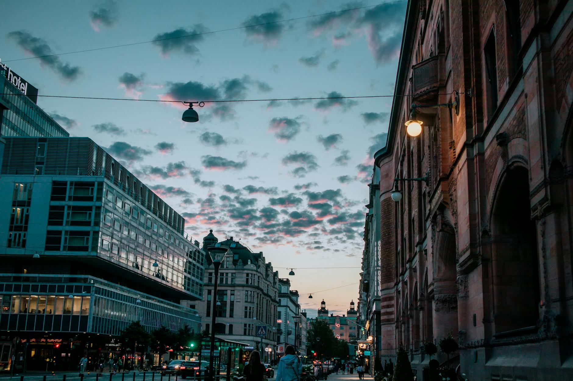 Stockholm street at twilight for luxury arrival and weather planning.