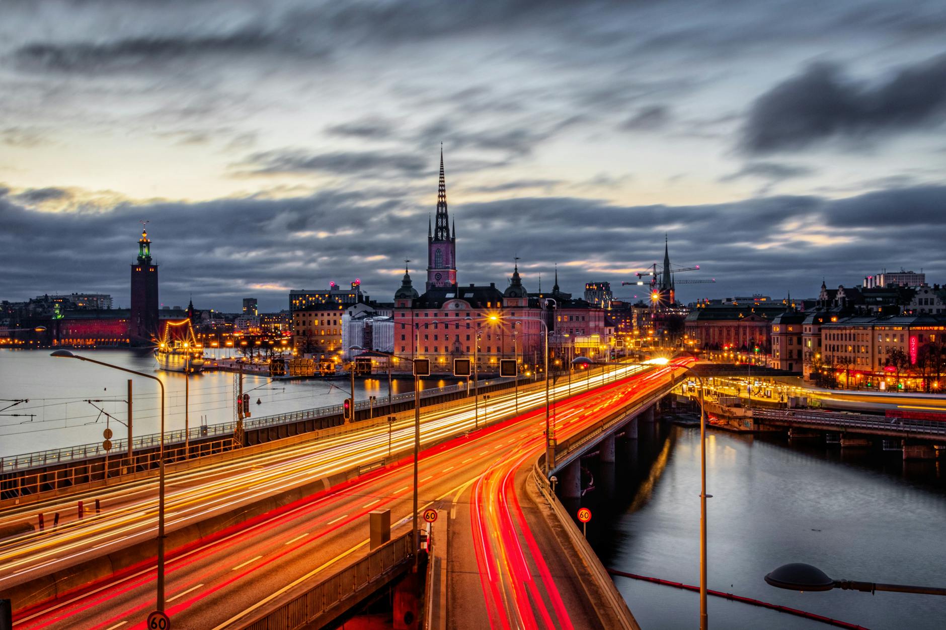Stockholm illuminated bridge at dusk for nightlife recovery planning.