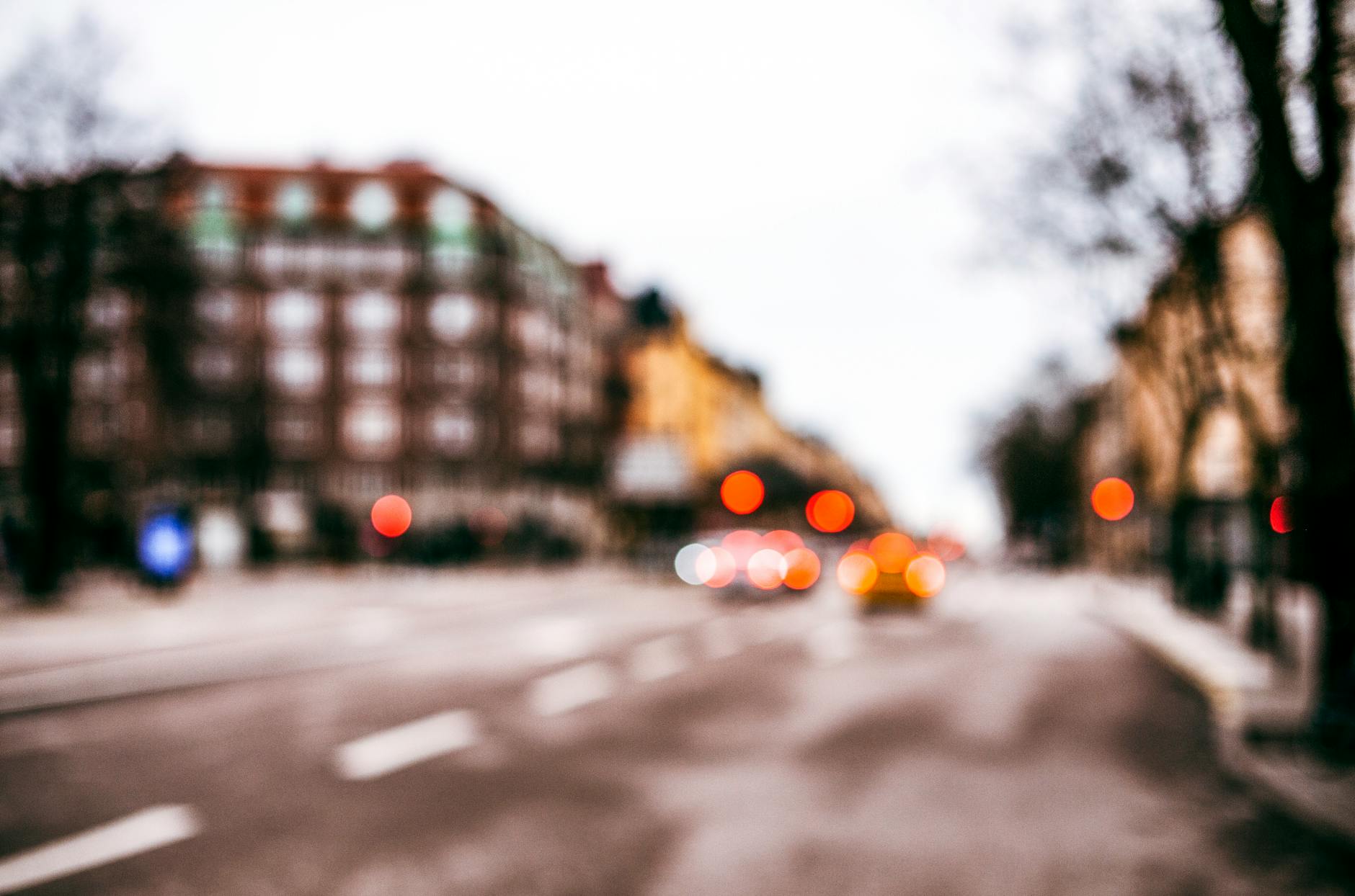 Blurred Stockholm night street lights for nightlife style planning.