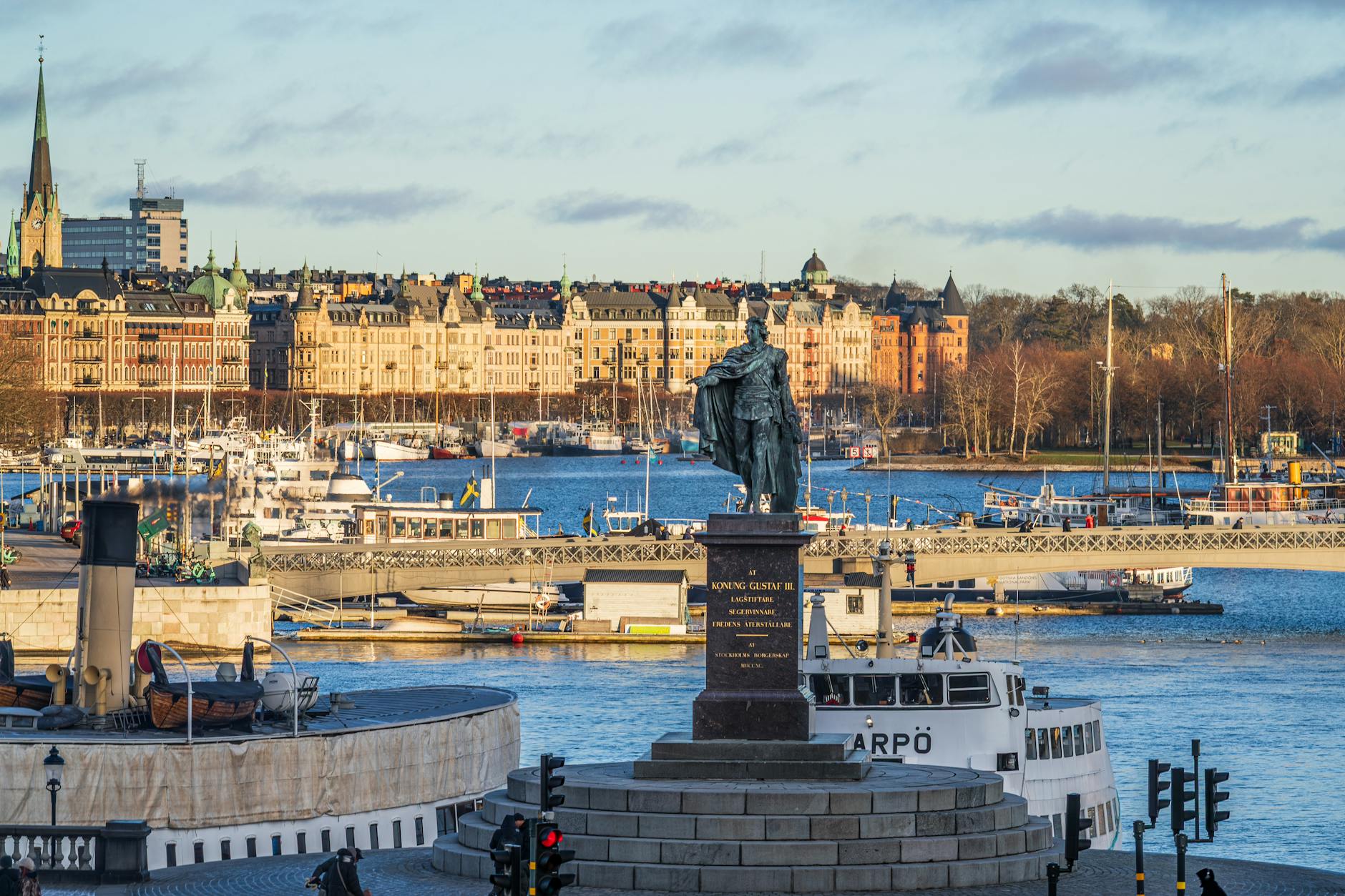 Stockholm harbor statue for older-traveler report planning.