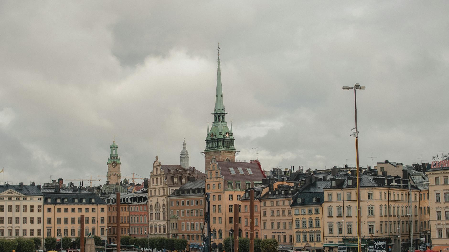Historic Stockholm skyline for church opening-hour planning.