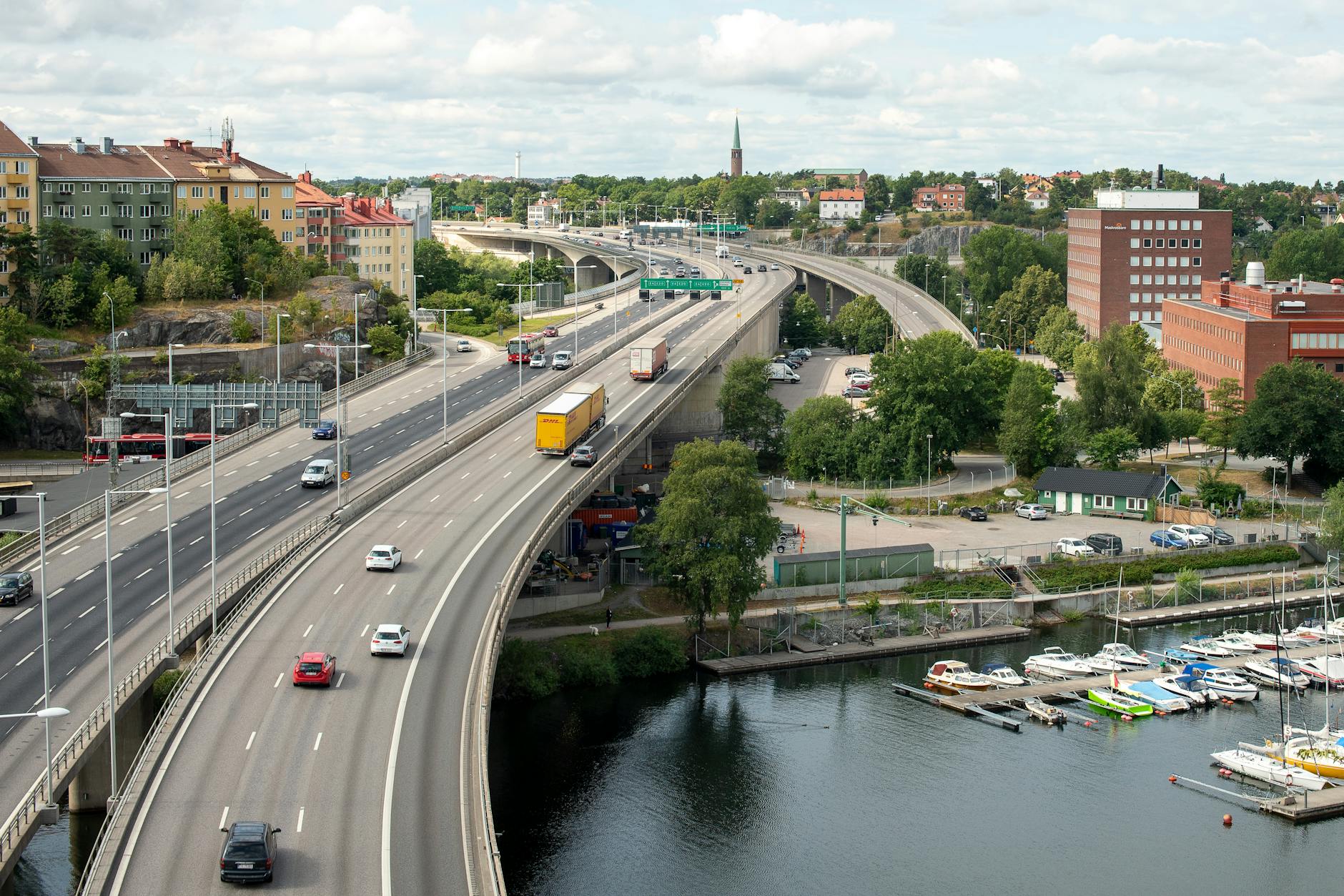 Aerial Stockholm traffic and marina for sales lodging location planning.