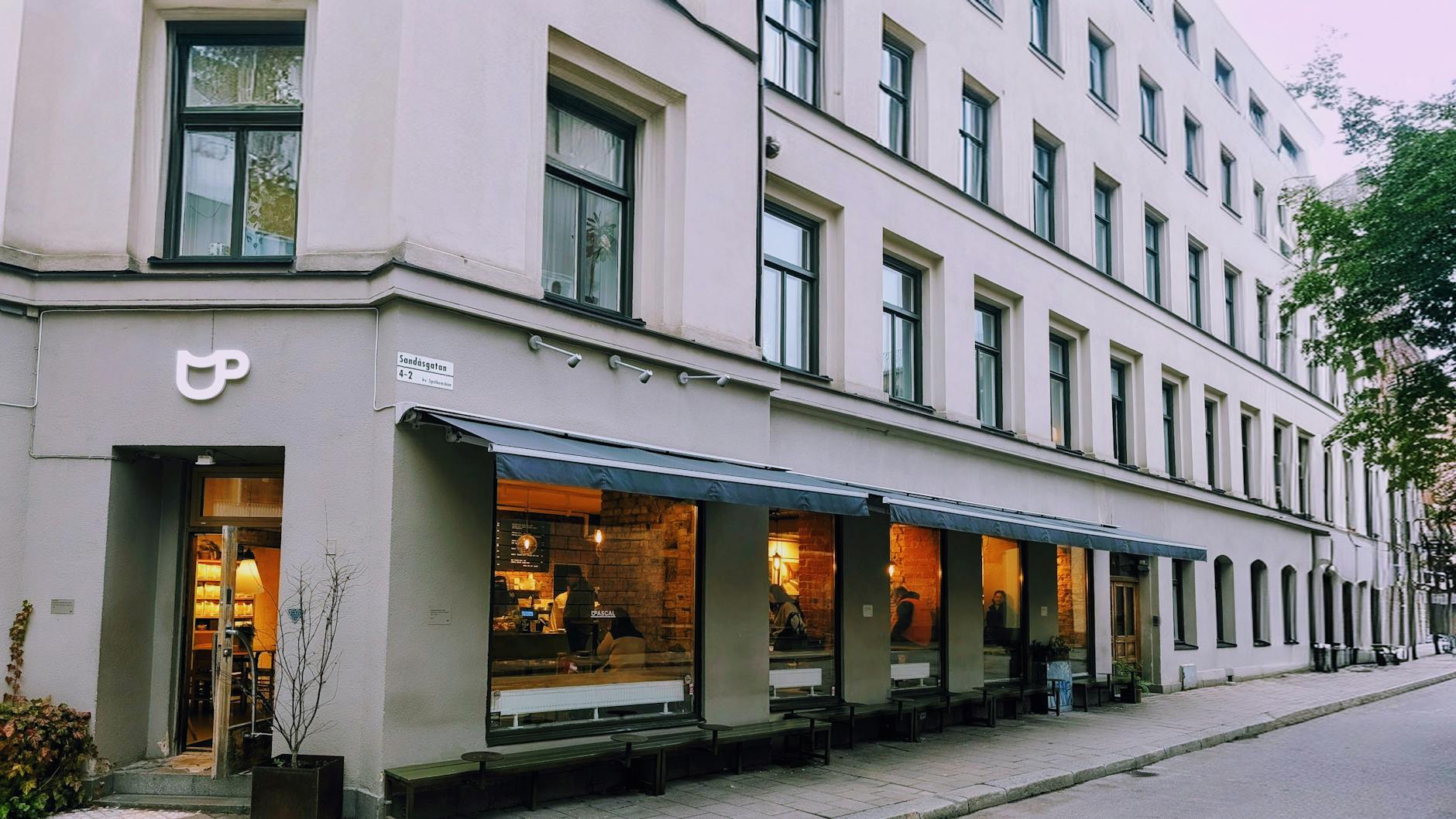 Corner cafe in Stockholm for solo pause planning.