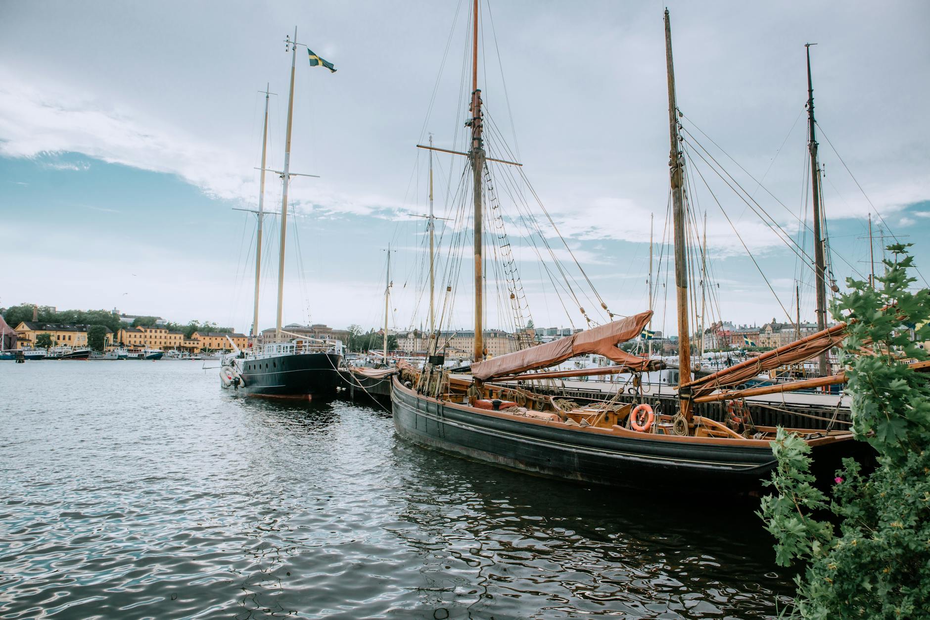 Stockholm harbor sailboats for volunteer safety and document planning.