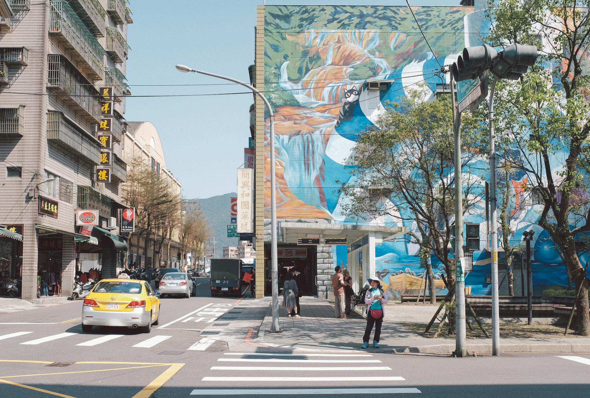 Tainan street scene and journalist reporting-trip planning context.