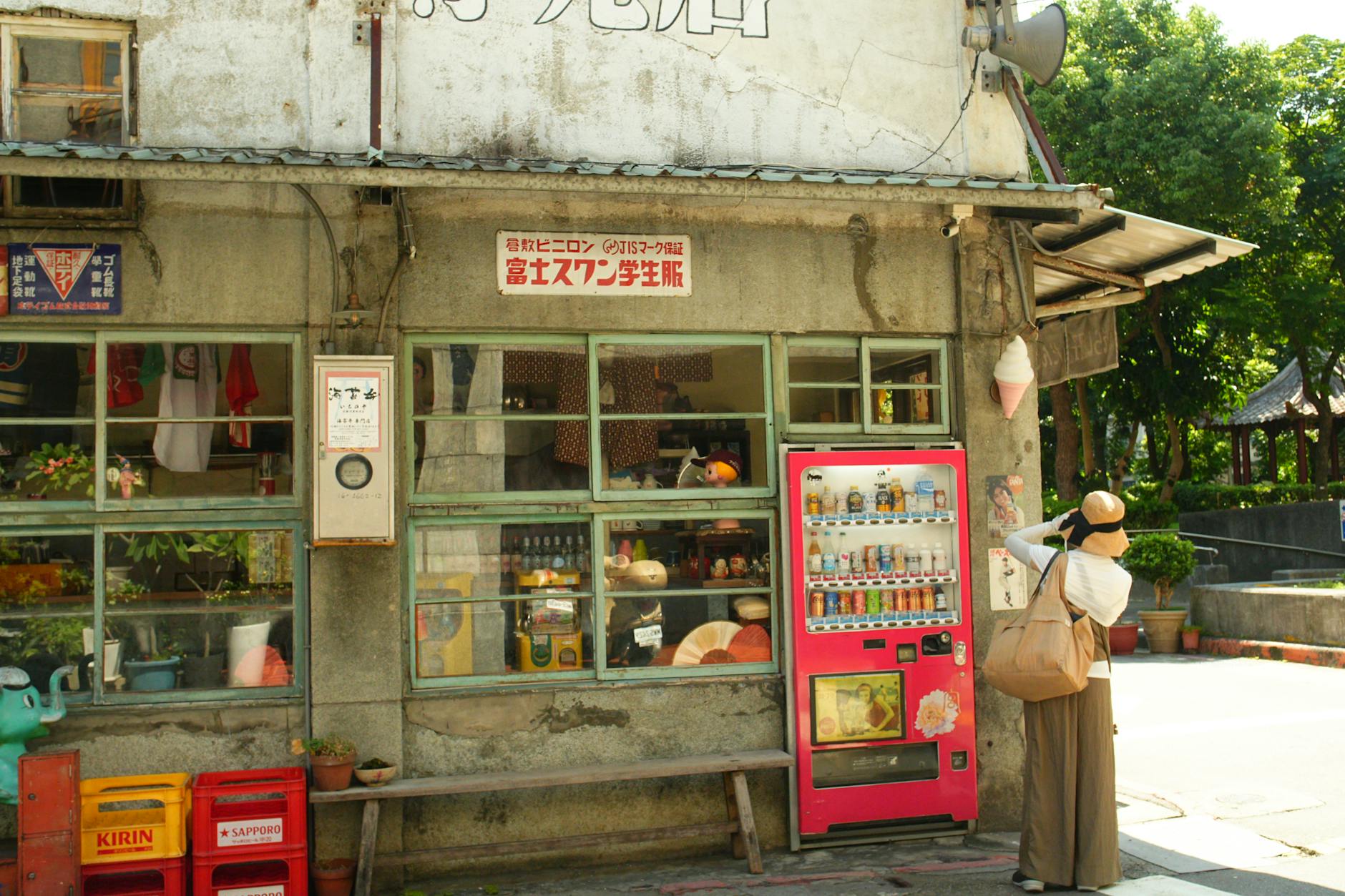 Tainan old street and woman traveler planning context.