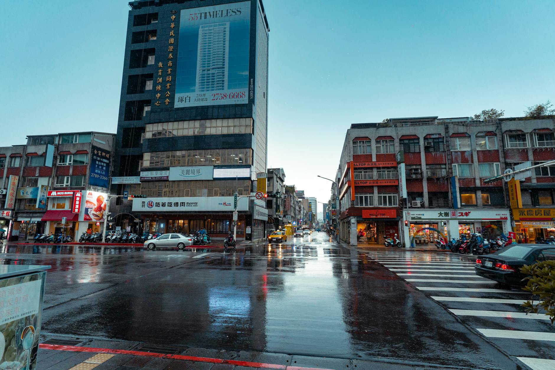 Rainy Taipei city street and conference contingency planning context.