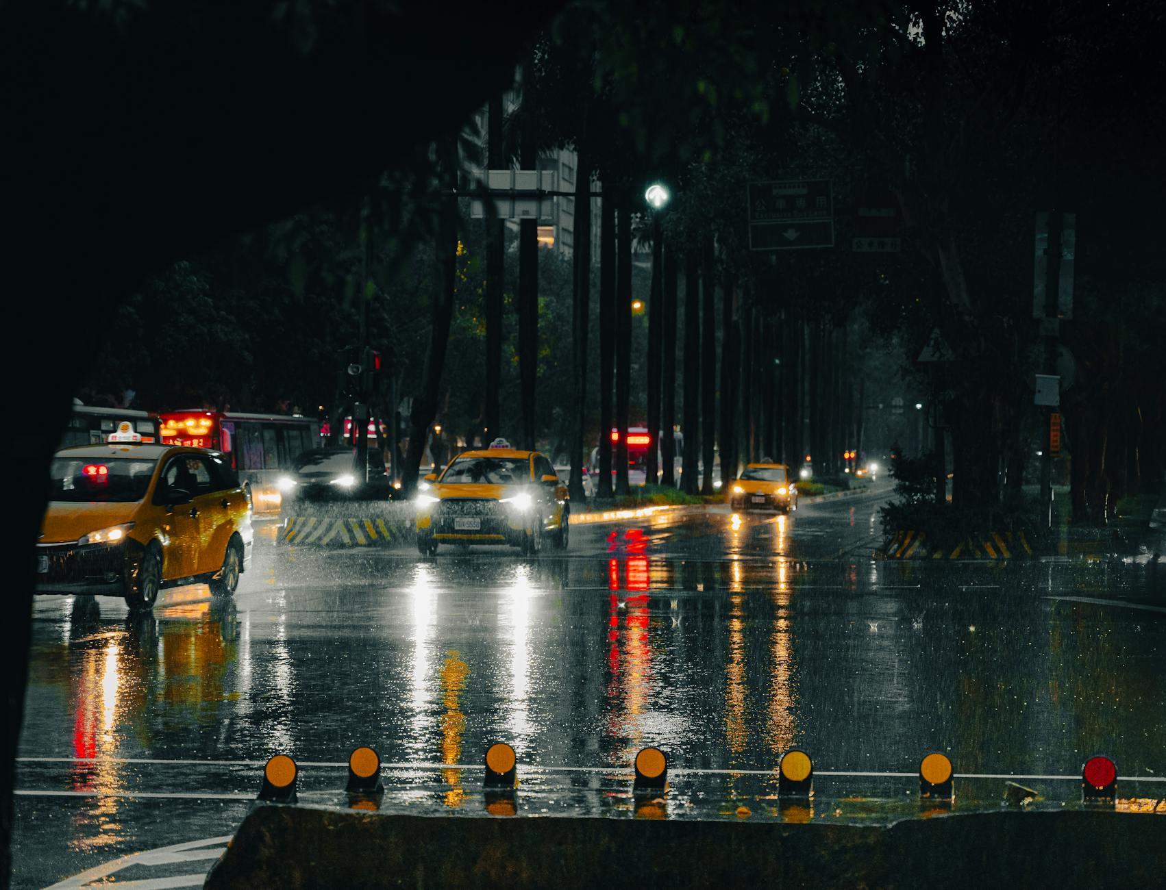Rainy Taipei street and business contingency planning context.