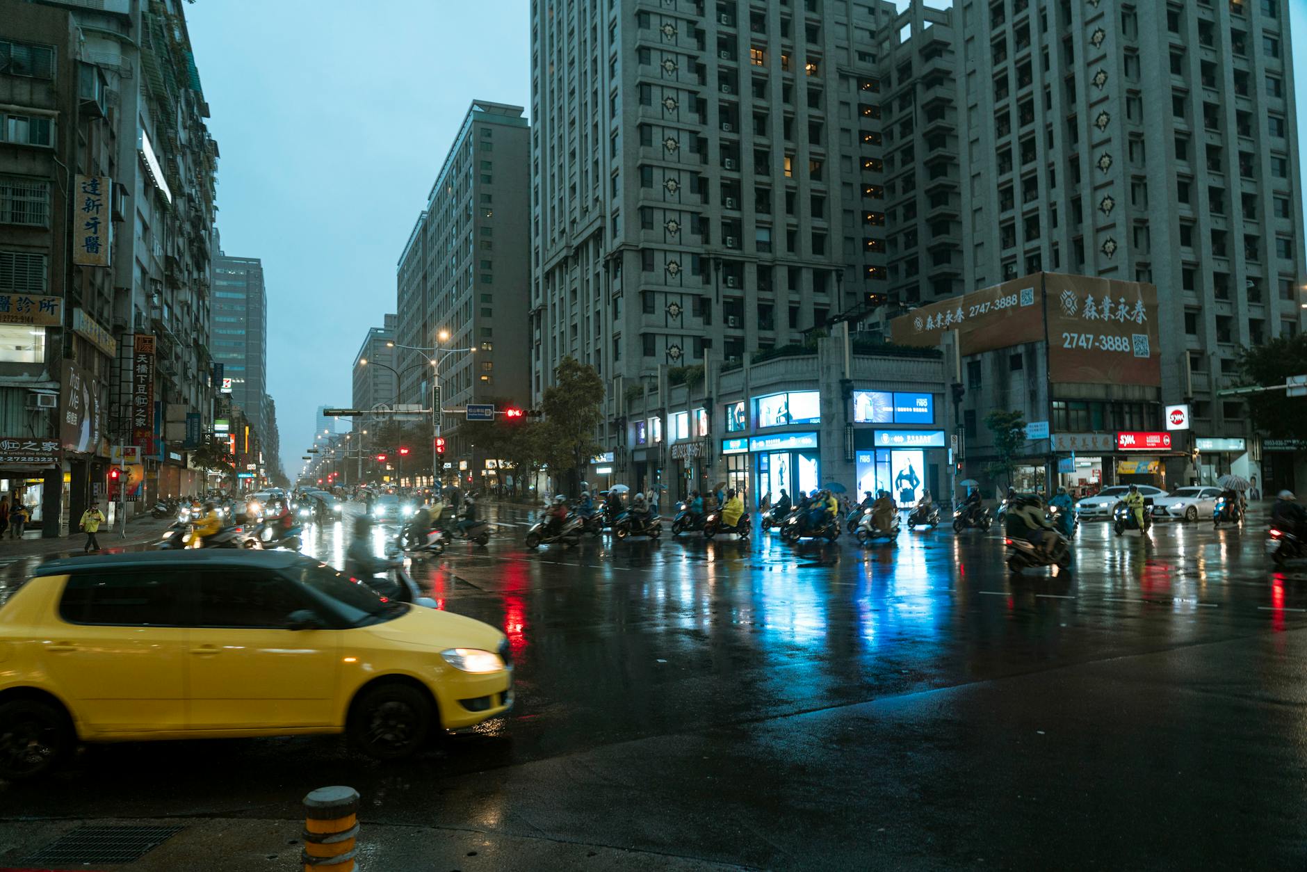 Rainy Taipei street and first-time weather planning context.