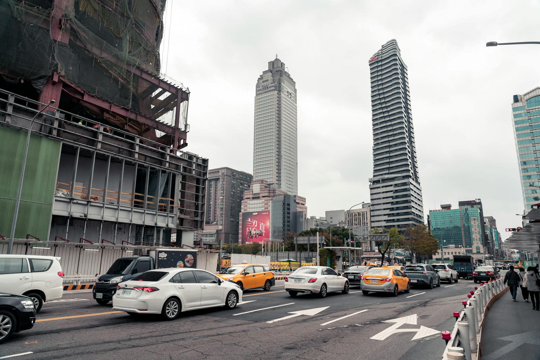 Taipei city street and luxury transfer planning context.