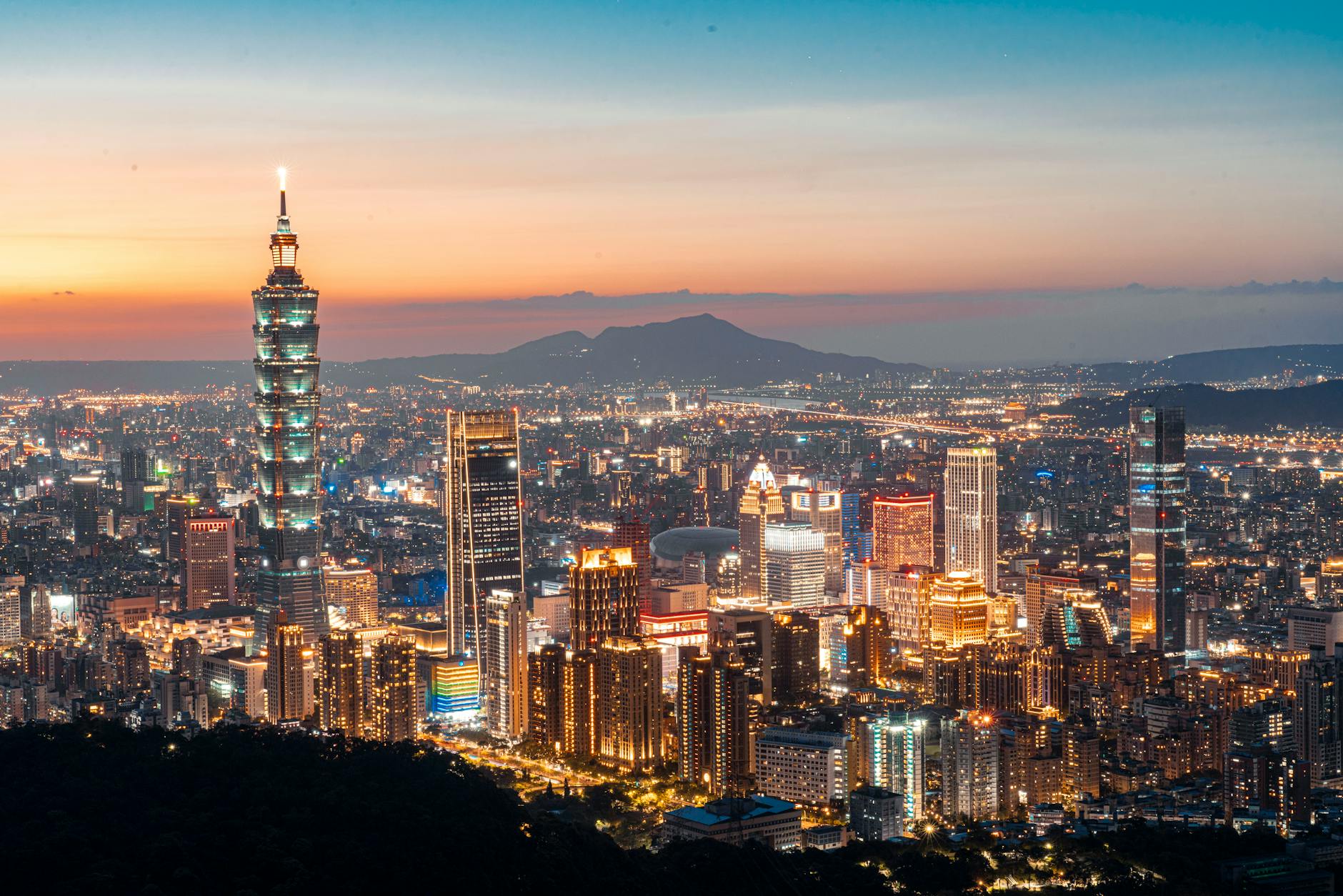 Taipei skyline and older traveler report planning context.