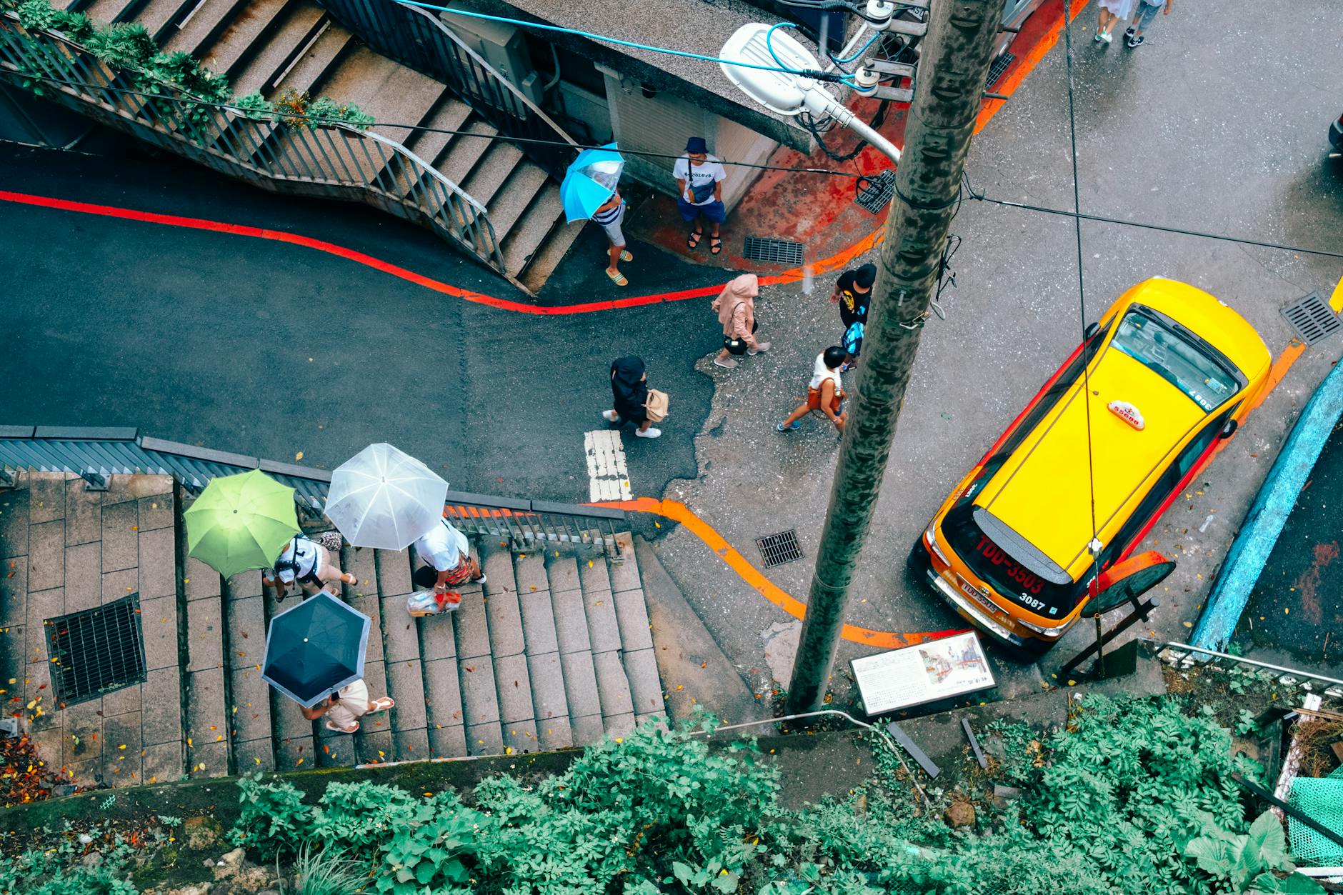 Rainy Taipei street and older traveler health planning context.
