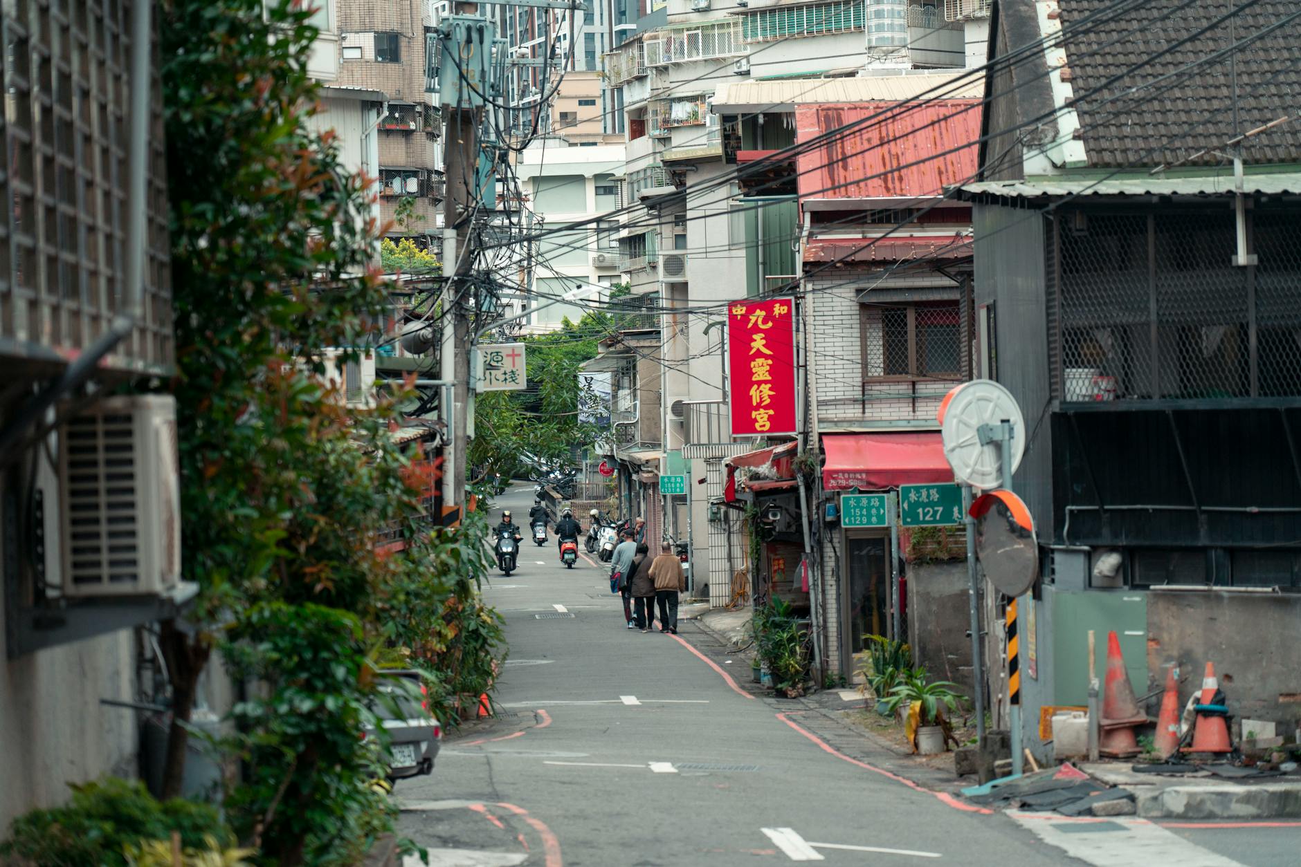 Taipei neighborhood street and repeat leisure visitor planning context.