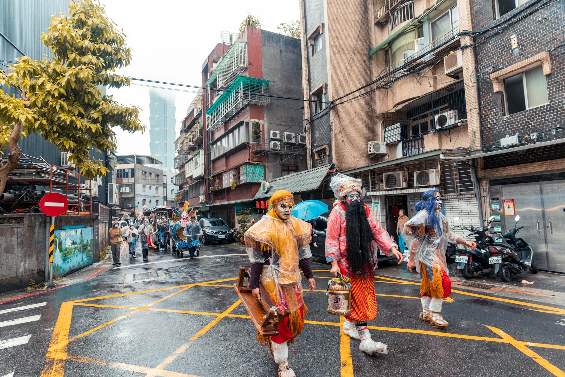 Taipei community street and volunteer role planning context.