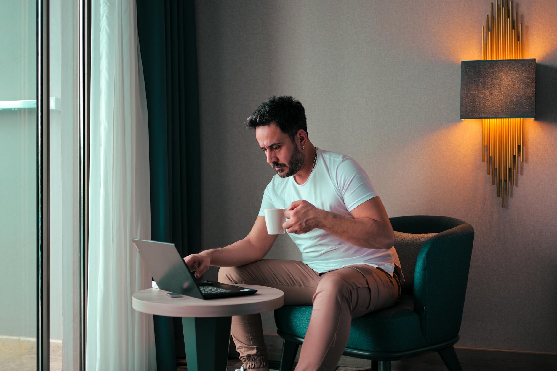 Business traveler working at a hotel desk for Trondheim work-base planning.