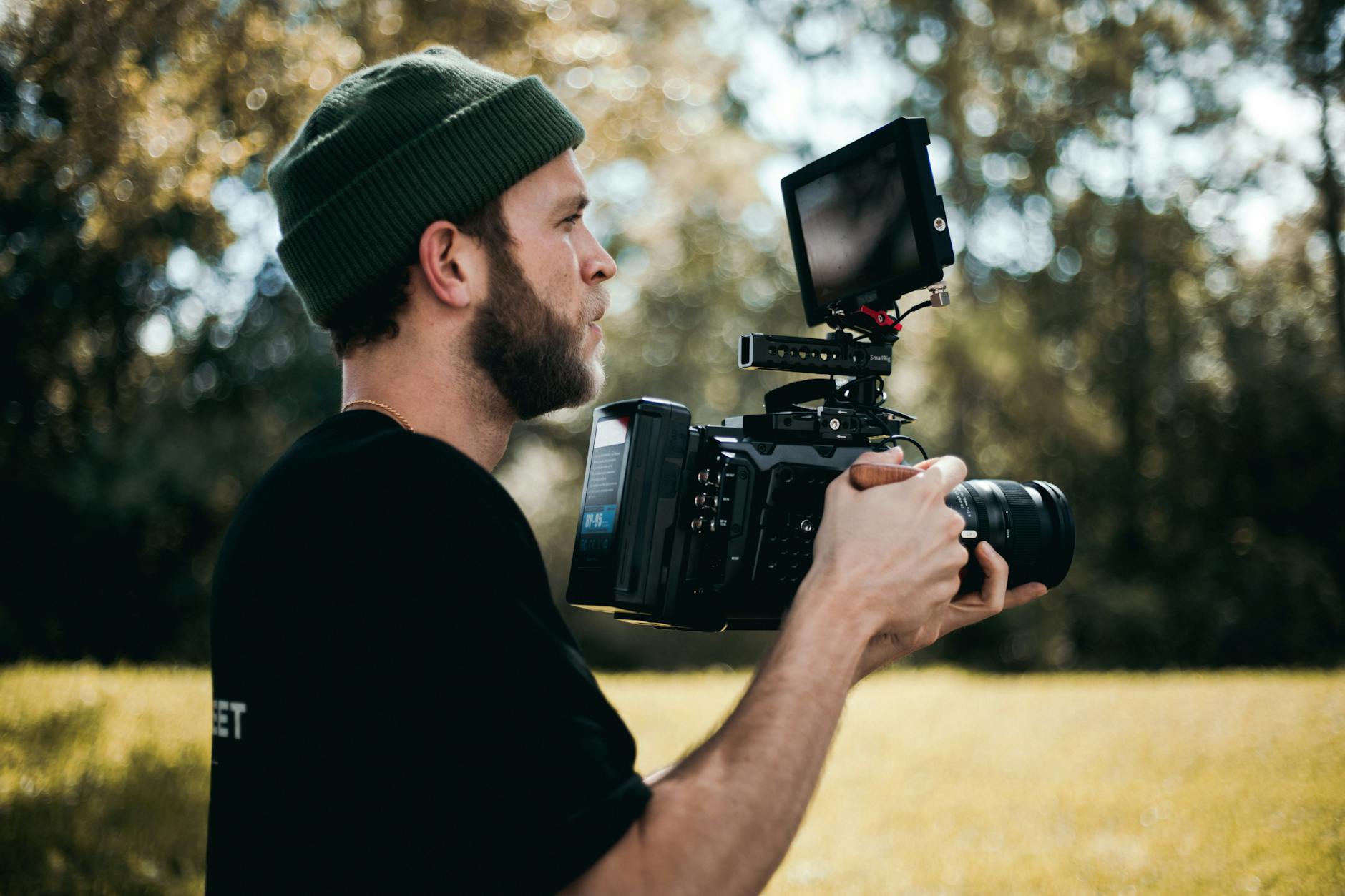 Creator holding a camera for Trondheim content-purpose planning.