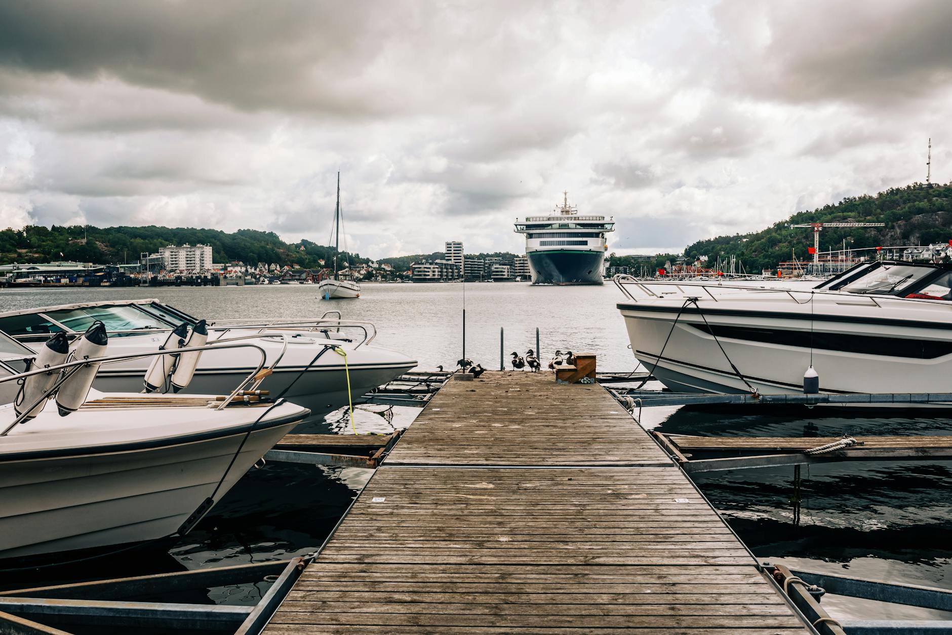 Pier, boats, and cruise ship for compact port-day route planning.