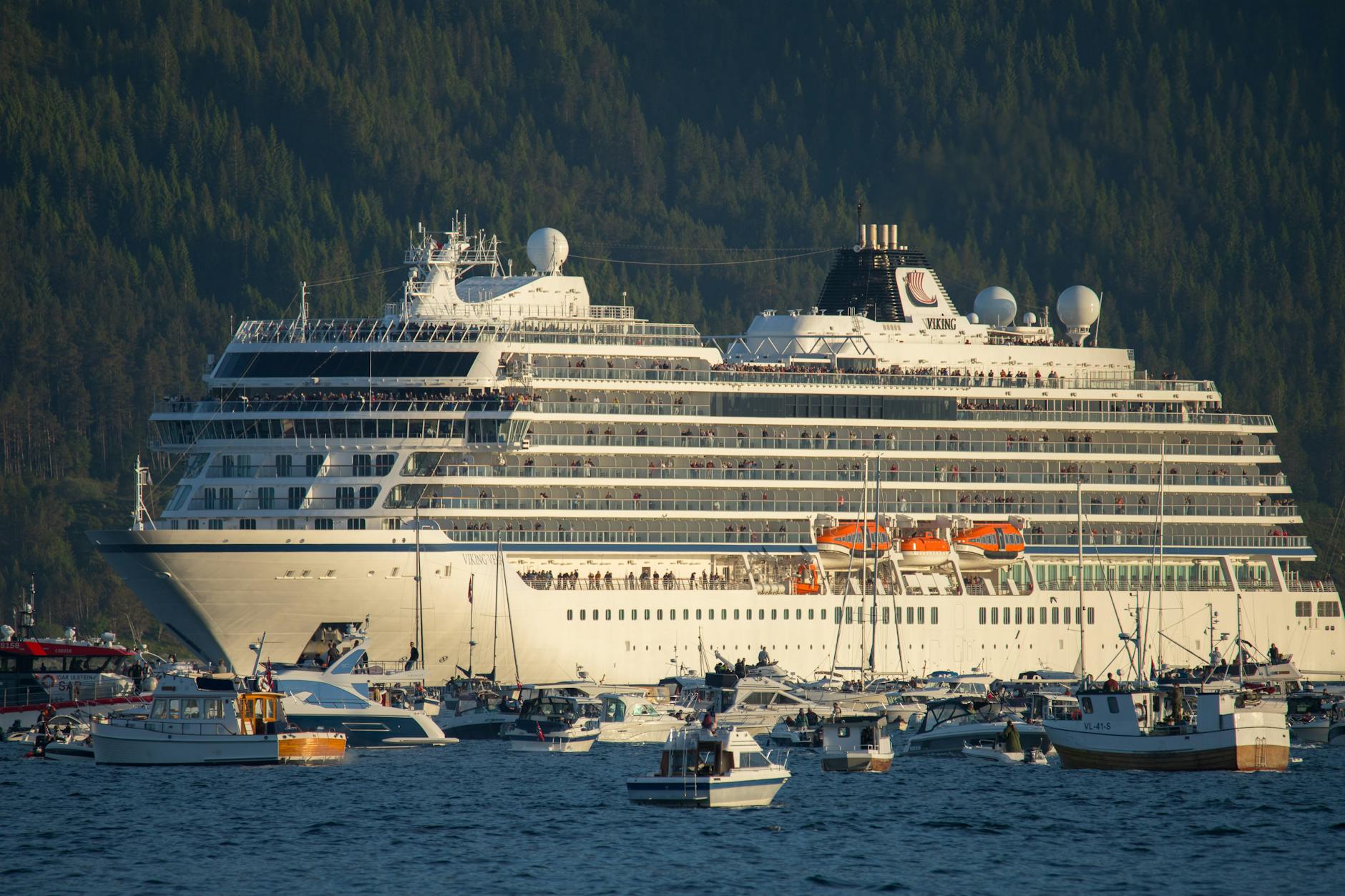 Cruise ship in a Norwegian harbor for Trondheim excursion planning.