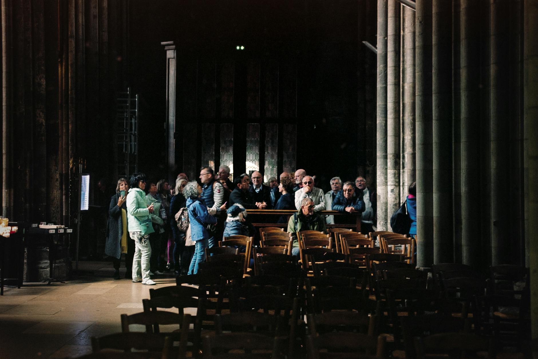 Visitors inside a church for family landmark timing planning.