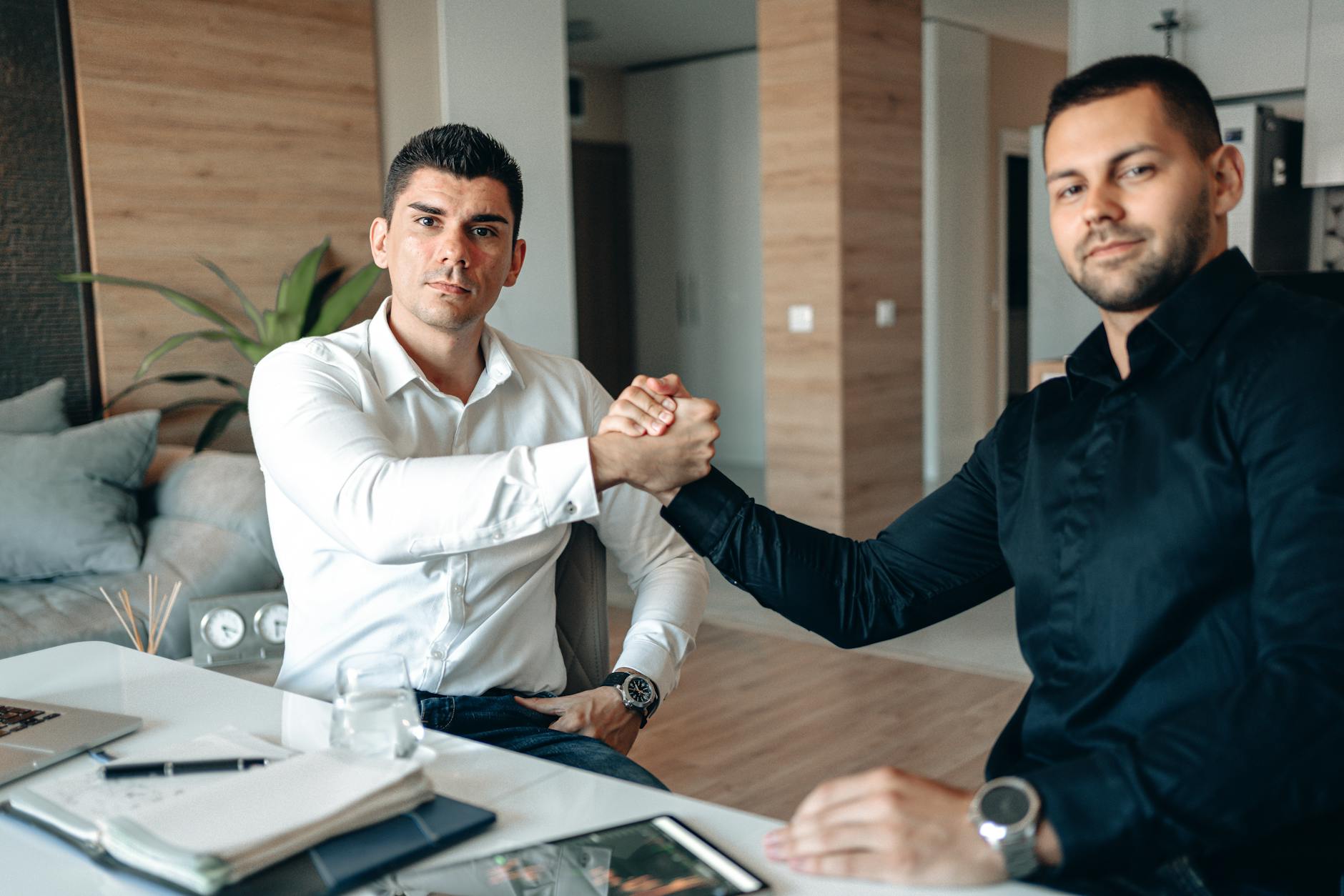 Business handshake for Trondheim investor and deal-team planning.