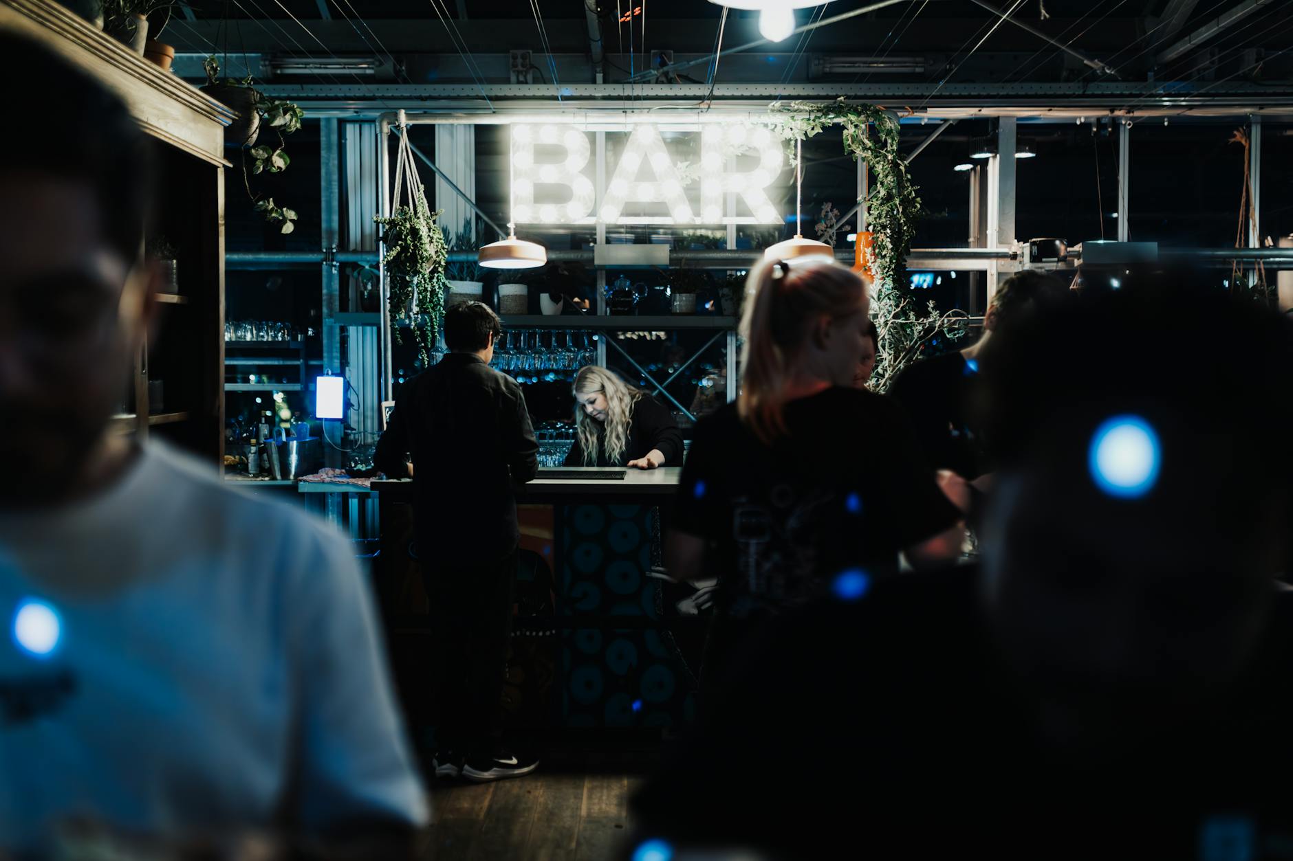 People in a bar for Trondheim nightlife-style planning.