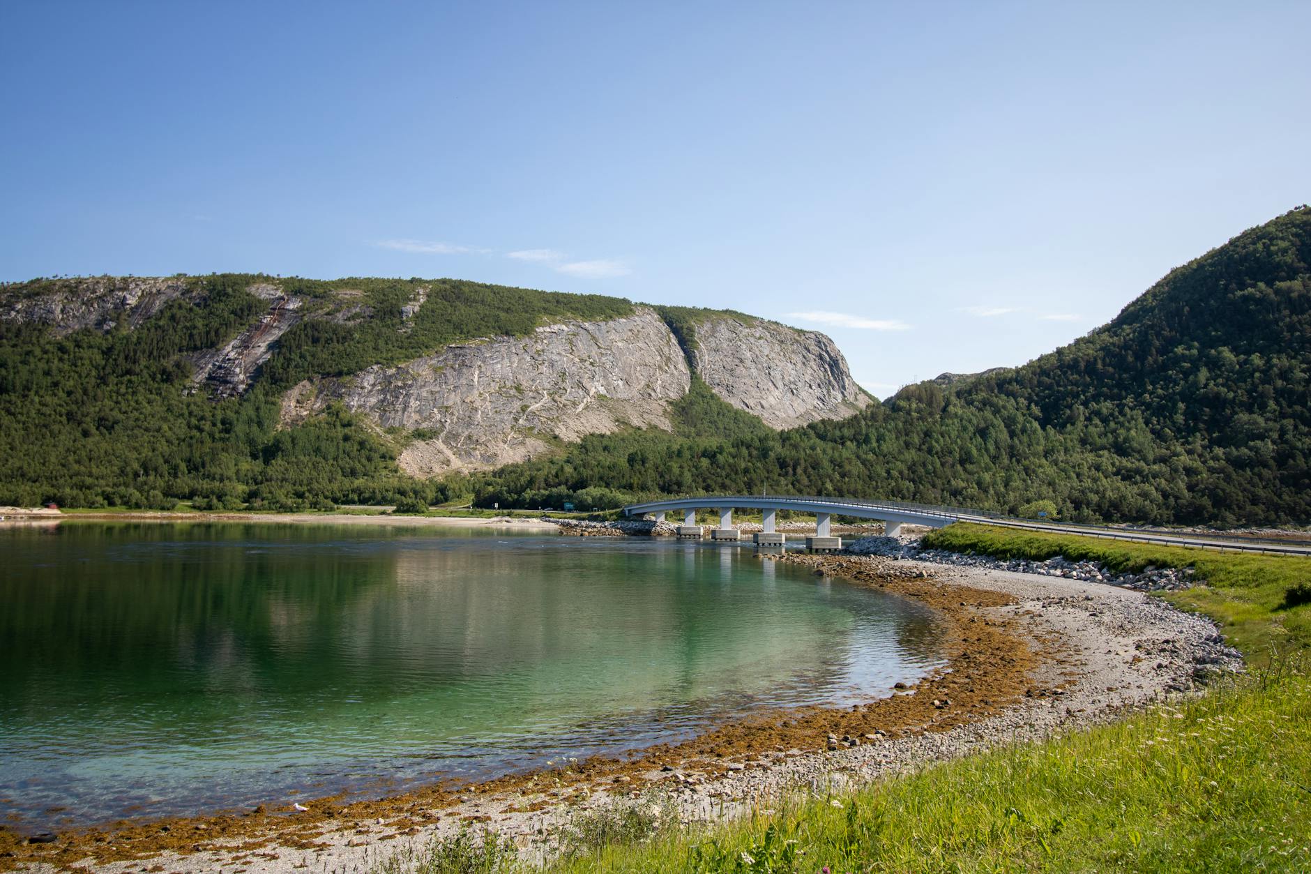 Bridge over a Norwegian lake for Trondheim repeat leisure report planning.