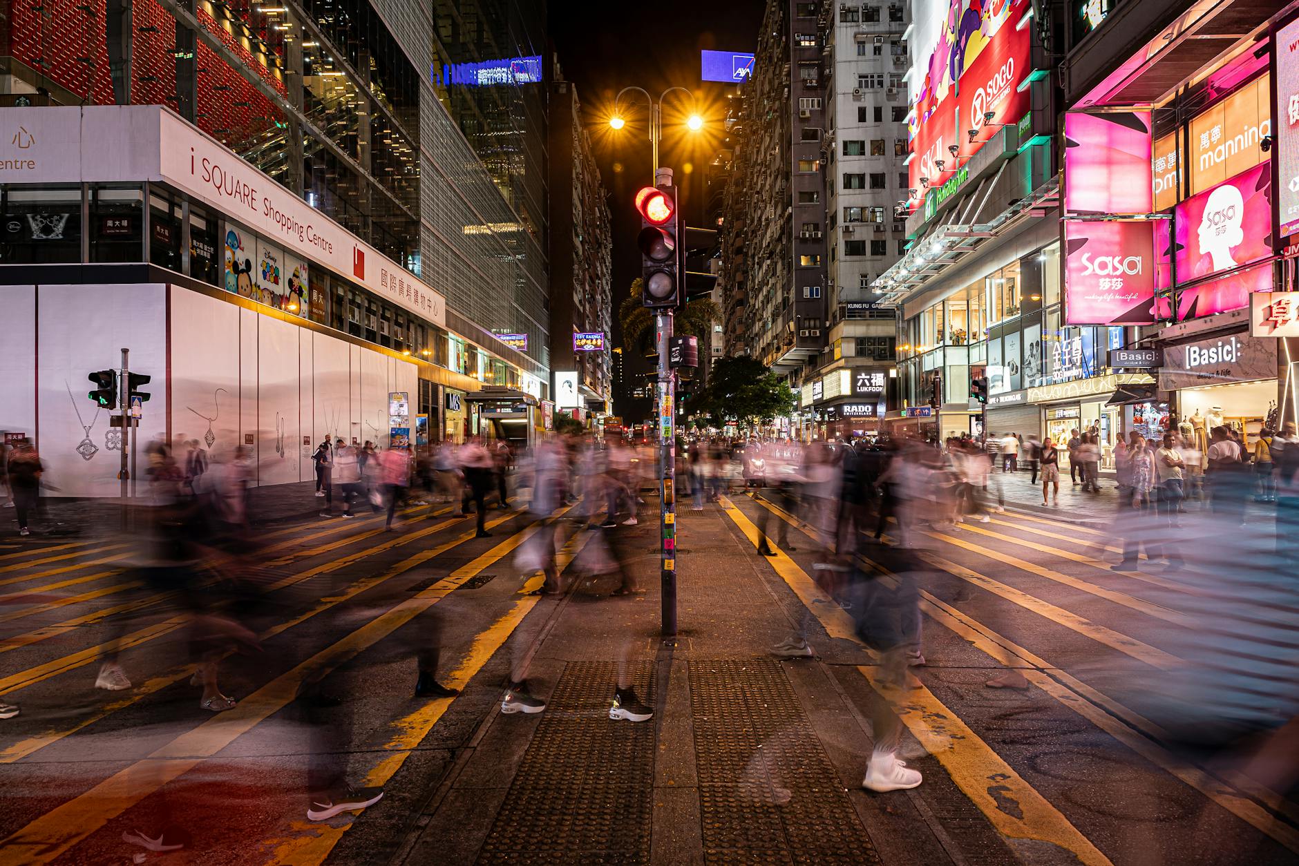 Tsim Sha Tsui night skyline and academic conference attendee planning context.