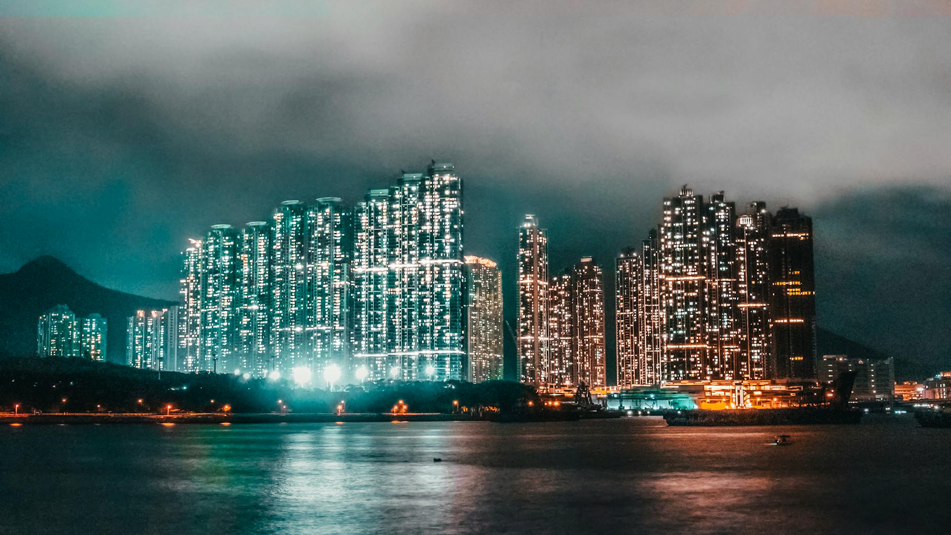Tsim Sha Tsui night skyline and content creator planning context.