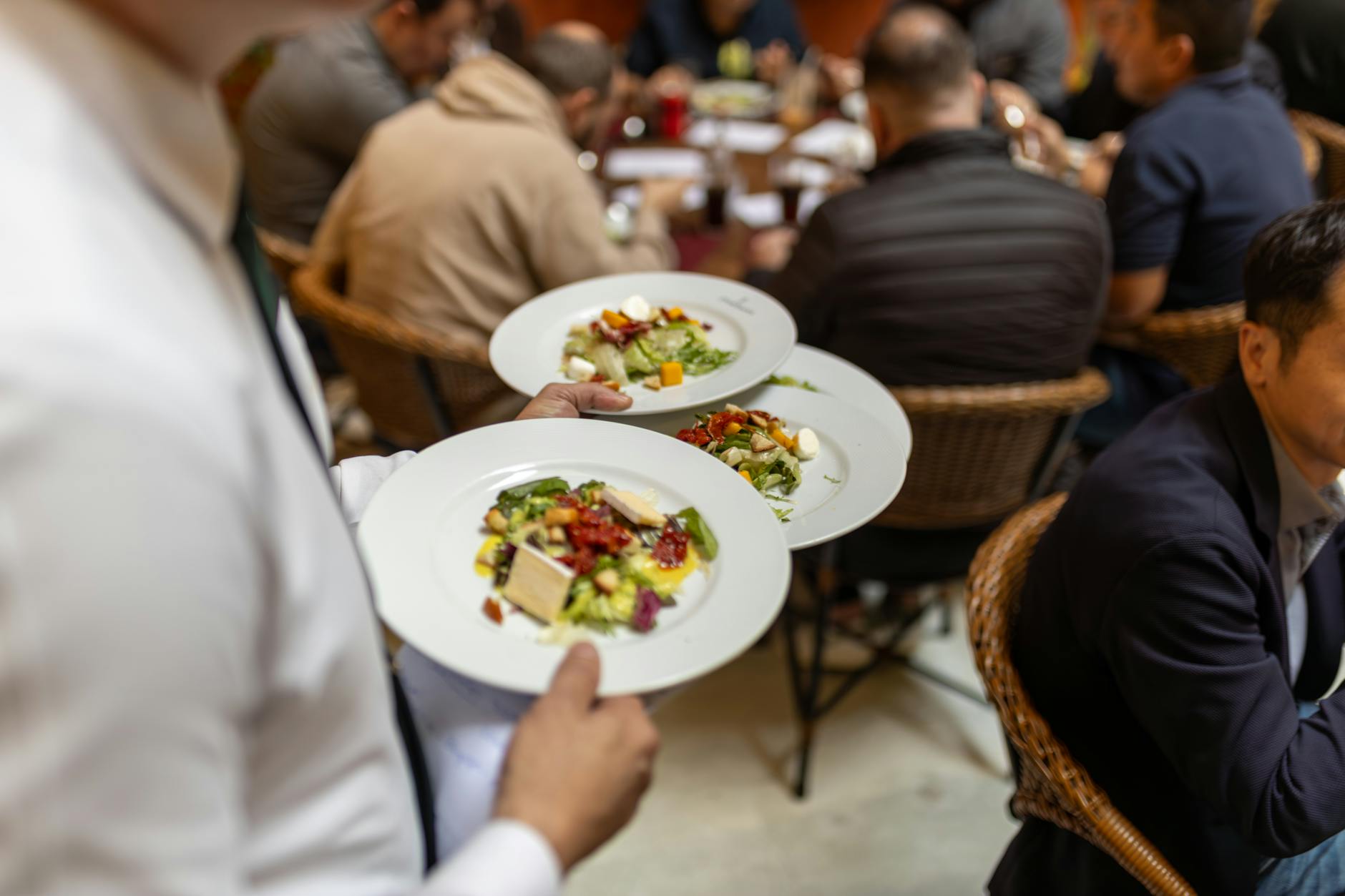 Restaurant and trade-show attendee client dinner planning context.