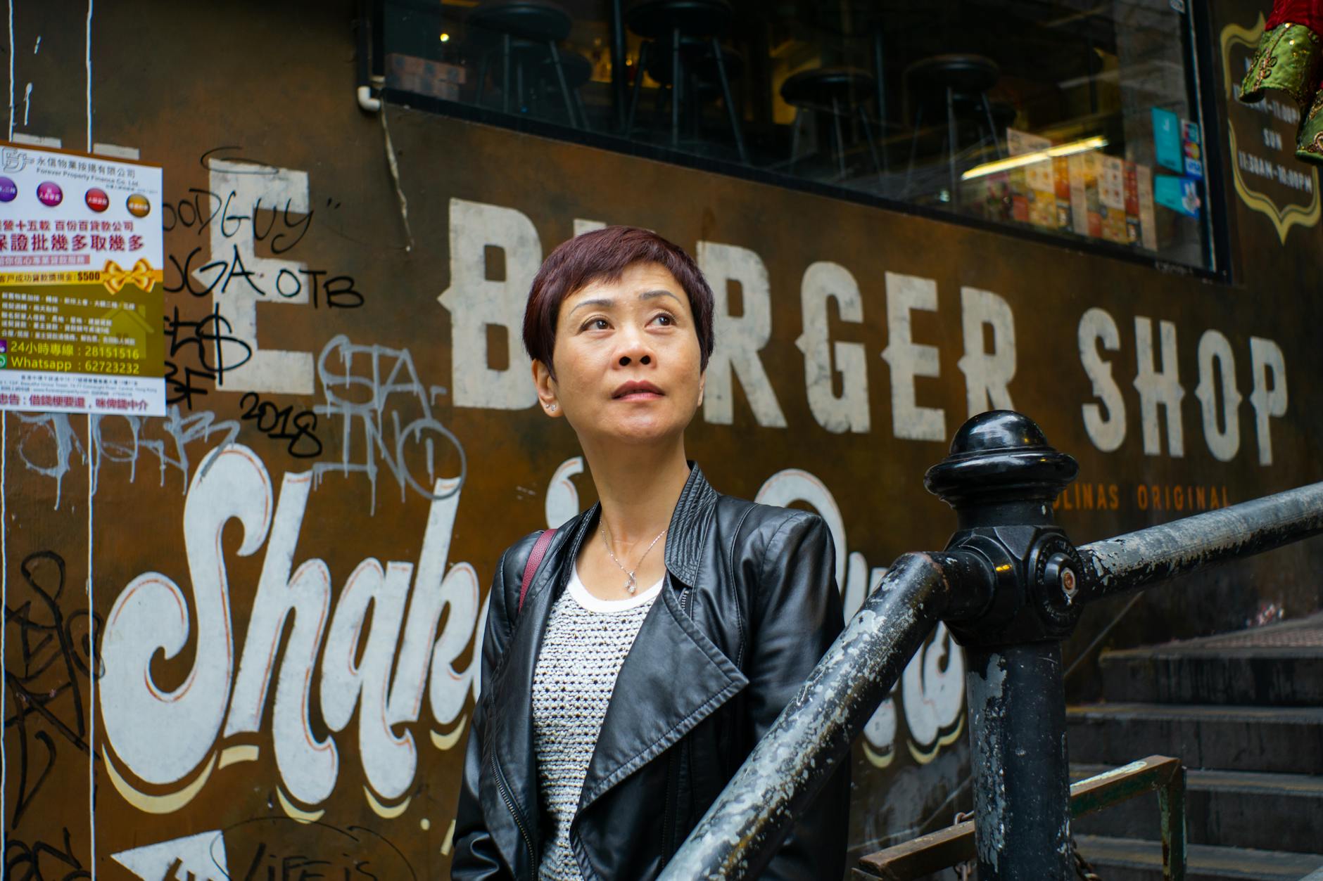 Tsim Sha Tsui restaurant and woman traveler meal planning context.