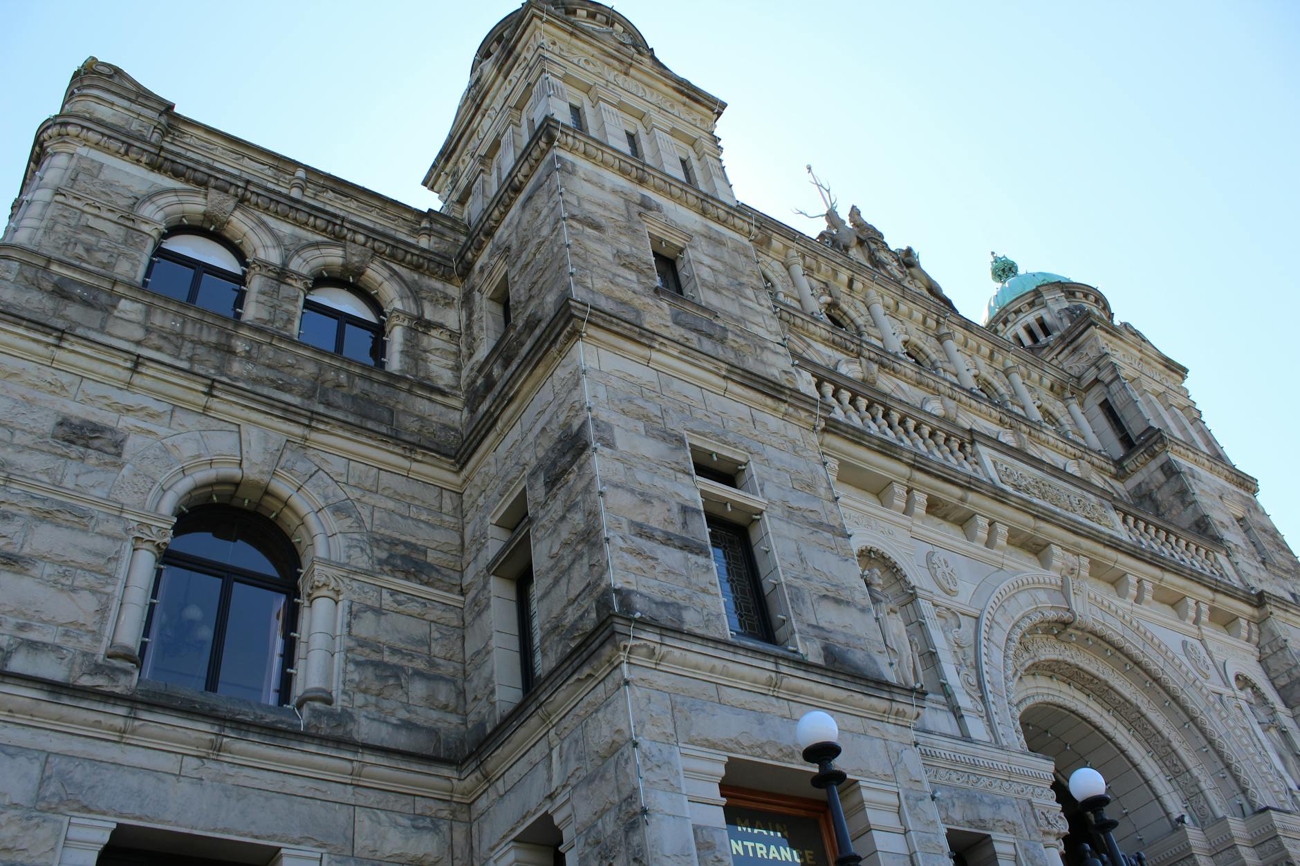 Historic stone building in Victoria, BC seen from below