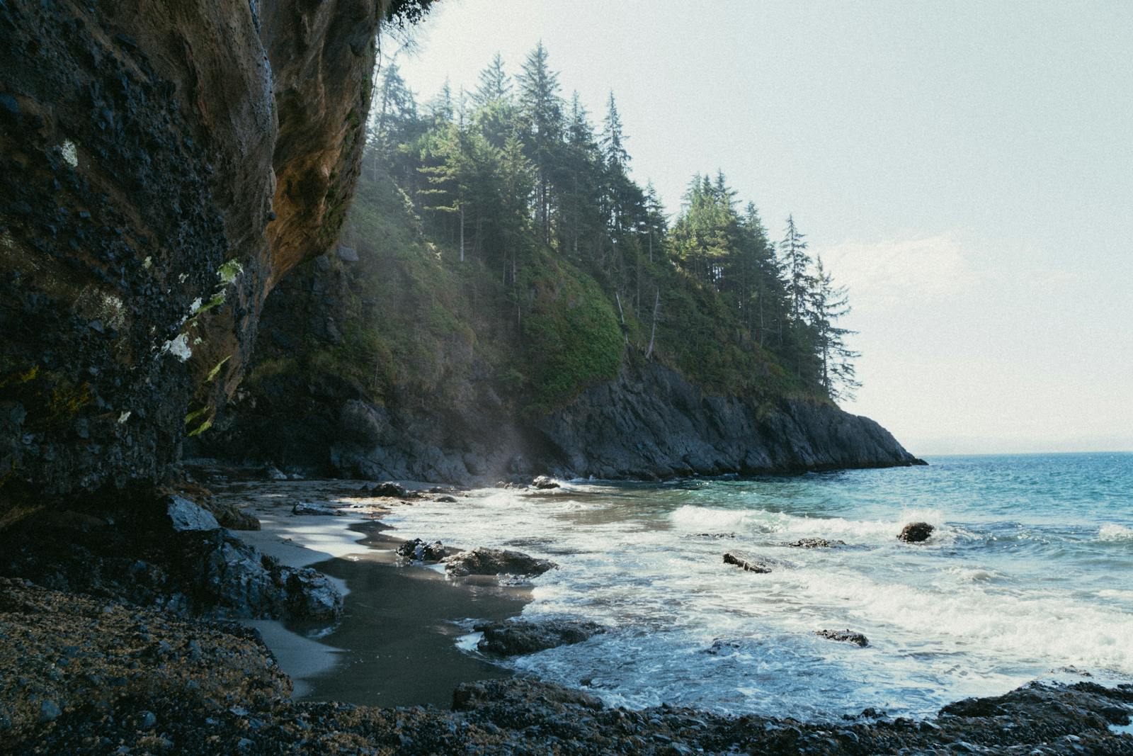 Beautiful coastal scene in Victoria, BC, Canada with cliffs and waves.